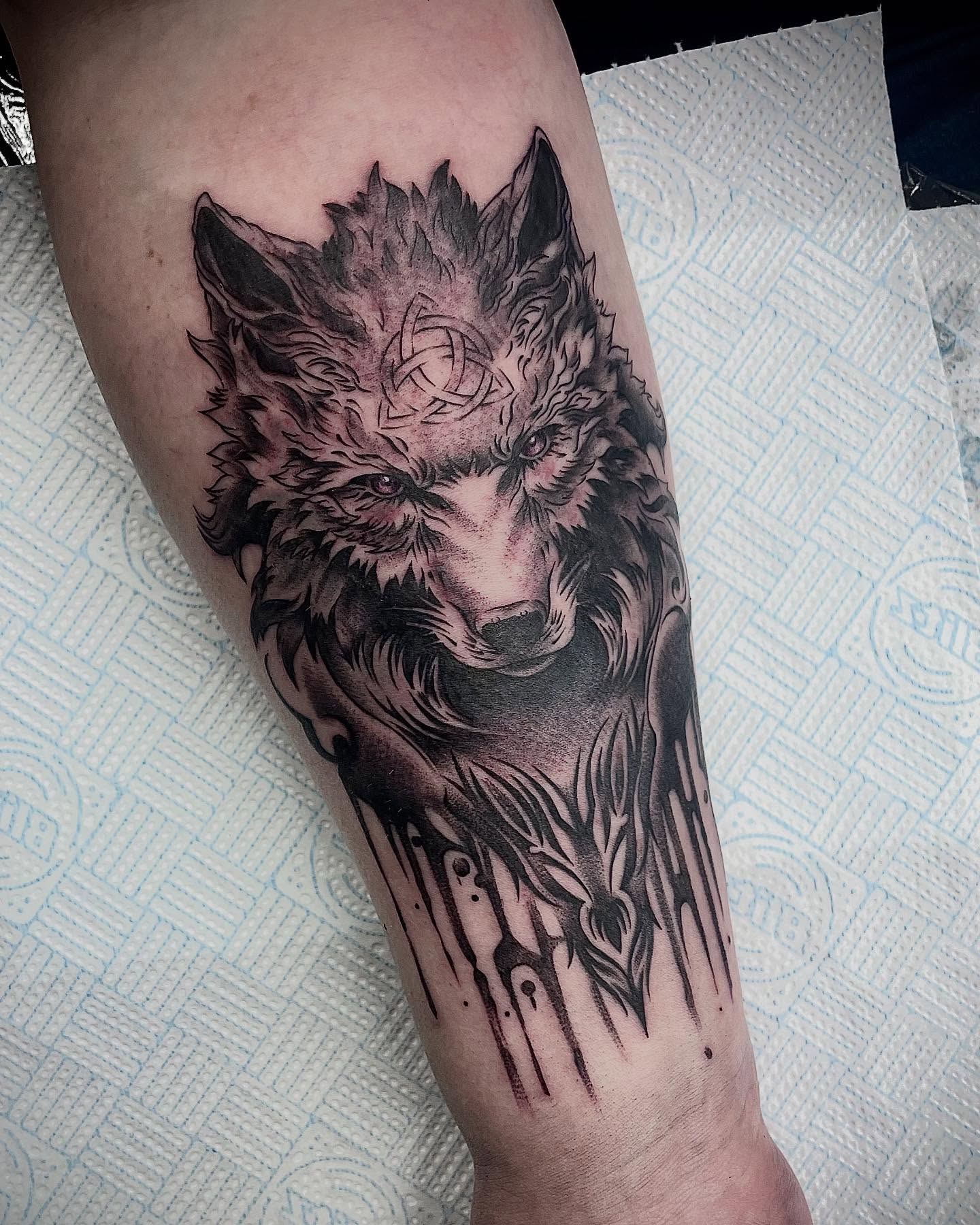 Wolf realism tattoo on the forearm by Grace derby tattooist, Derby