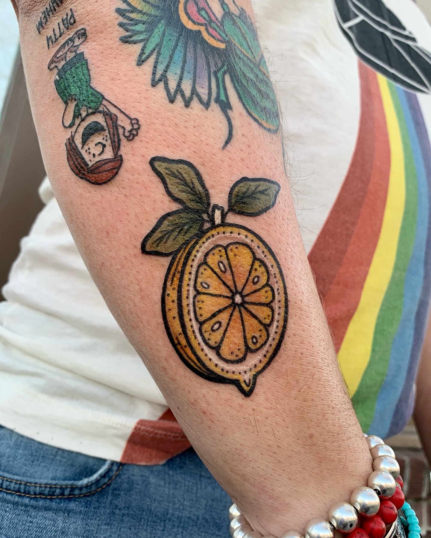 Lemon dotwork tattoo on the forearm by Laura