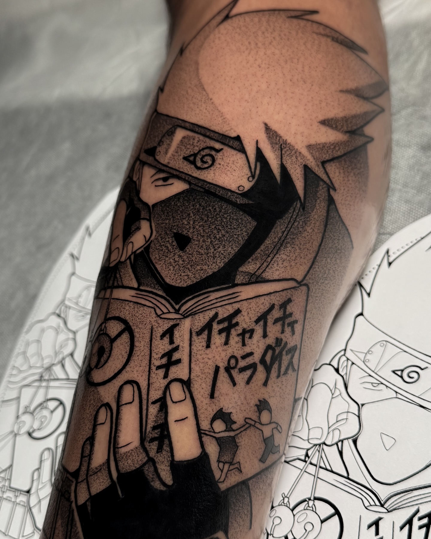 Anime character reading book dotwork tattoo on the forearm by Yakir, Houston, Texas