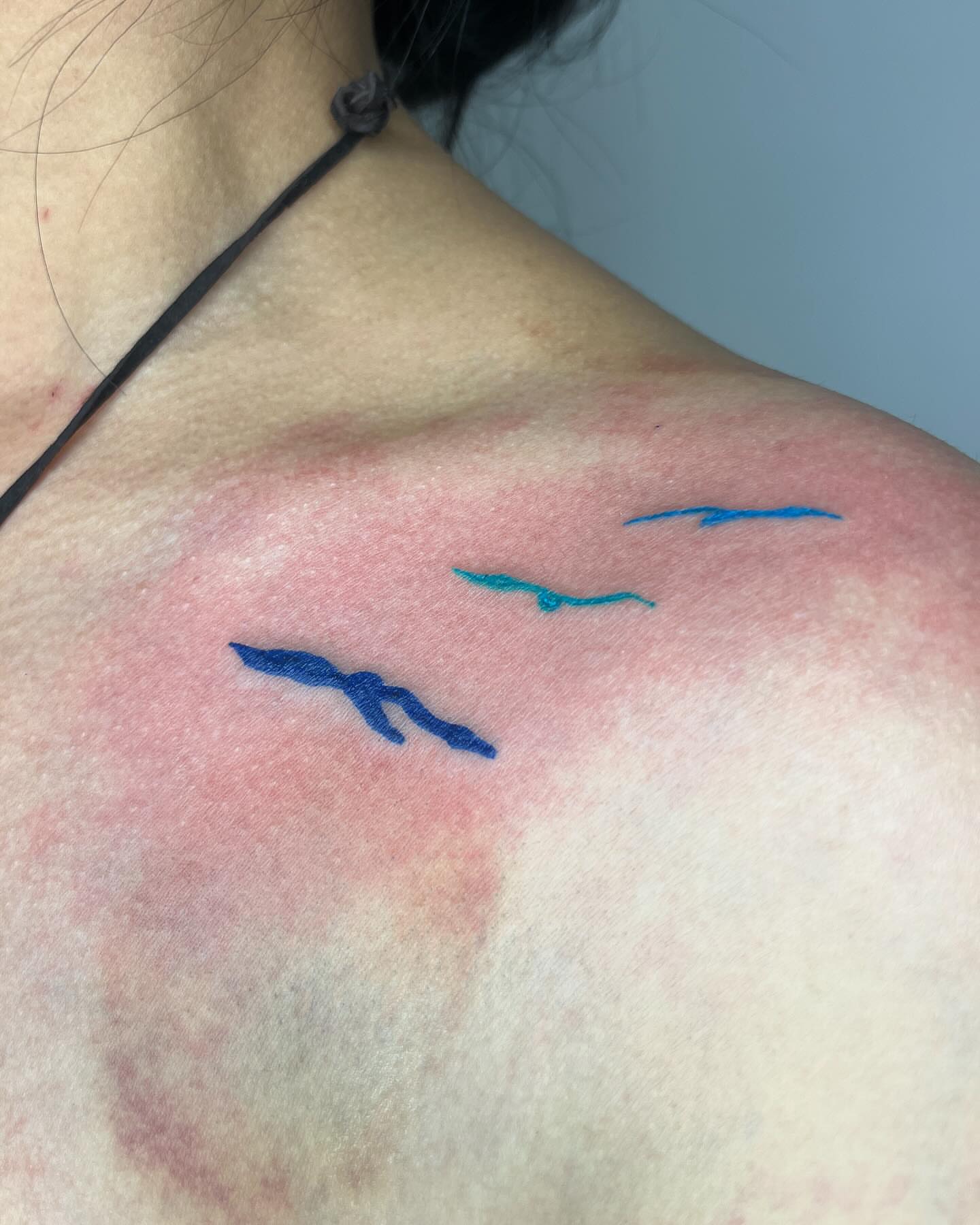 Birds fine line tattoo on the shoulder by tattoos by quin