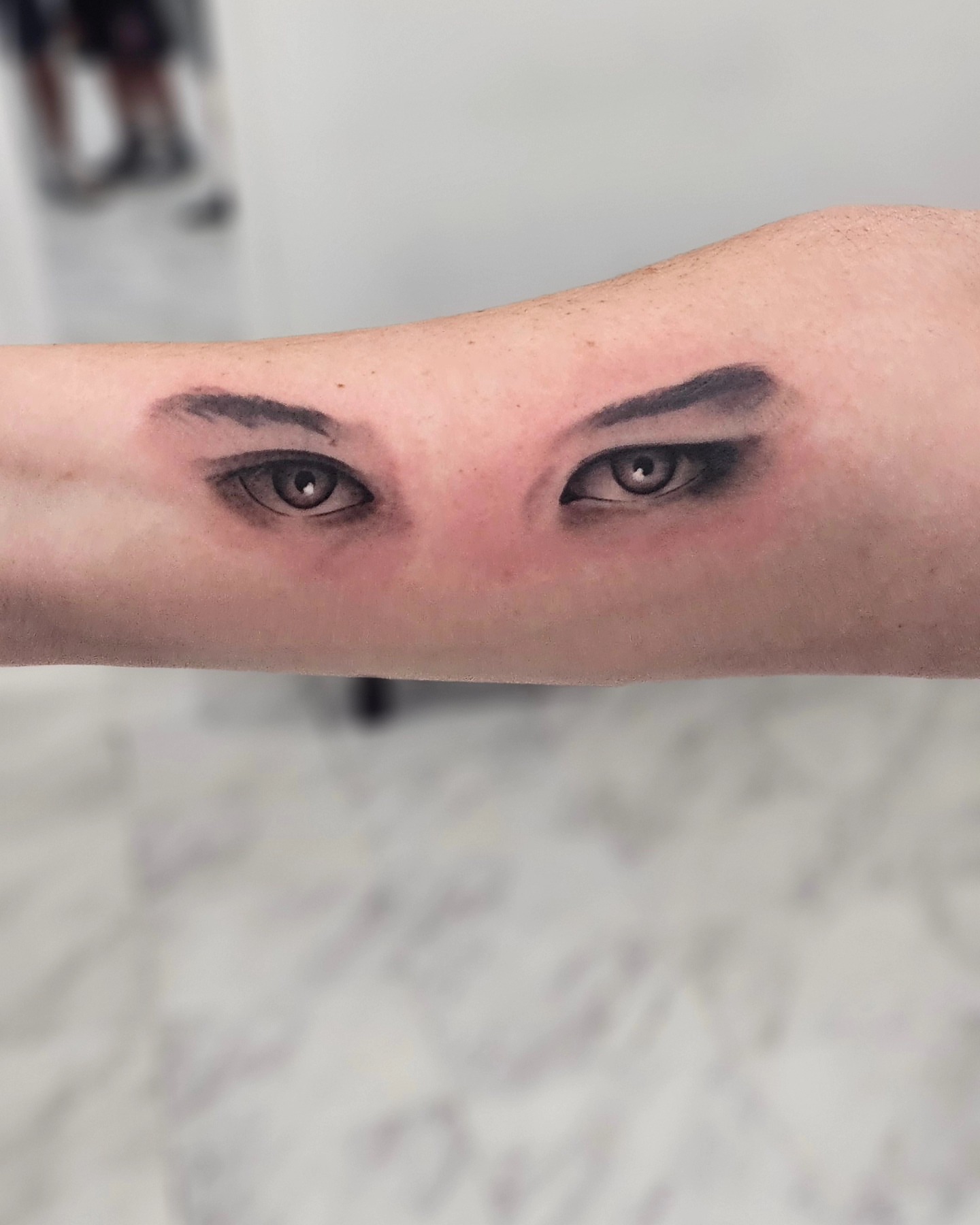 Eyes realism tattoo on the forearm by Herc