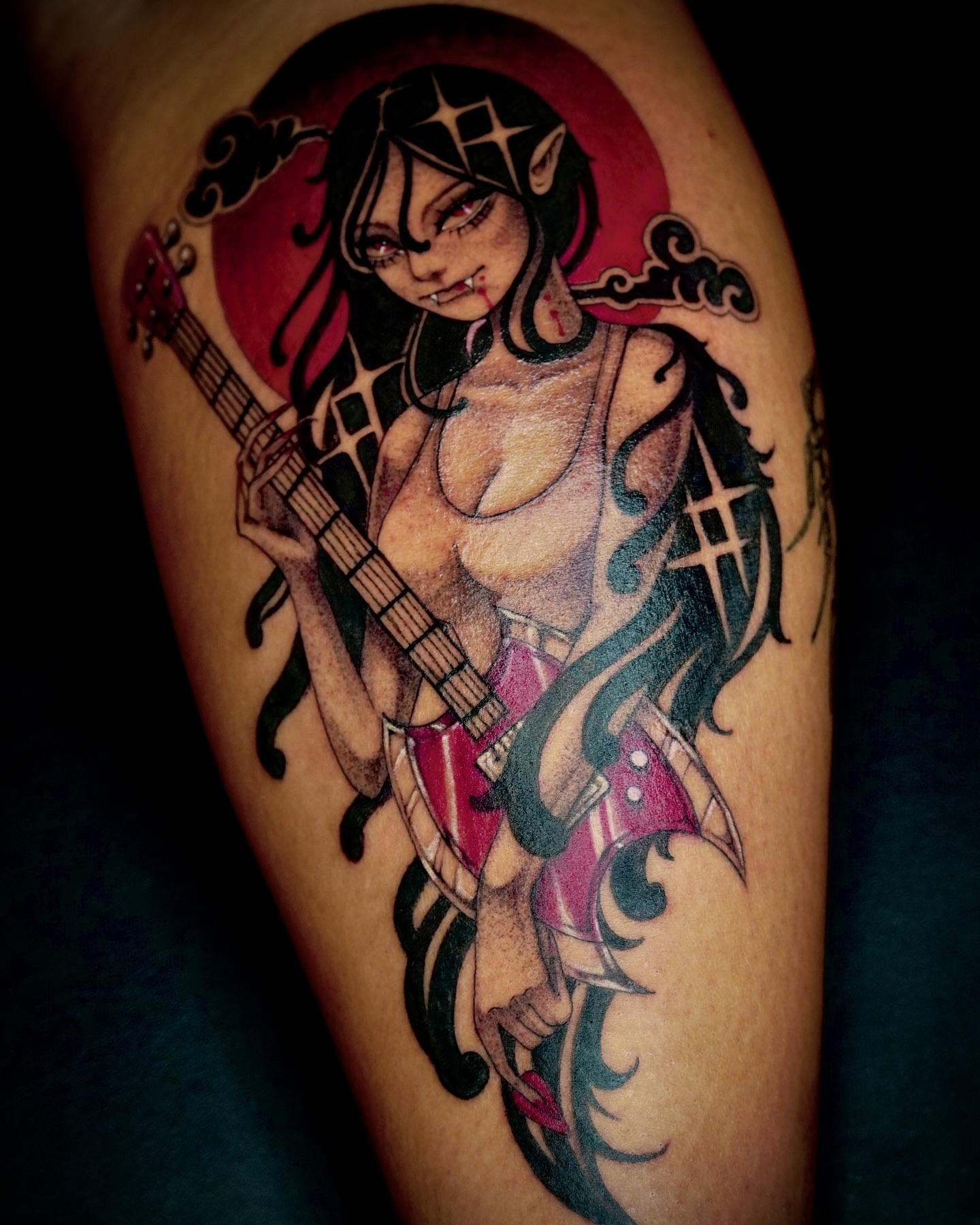 Elf woman with guitar anime tattoo on the forearm by 吳盈慧, Los Angeles, California