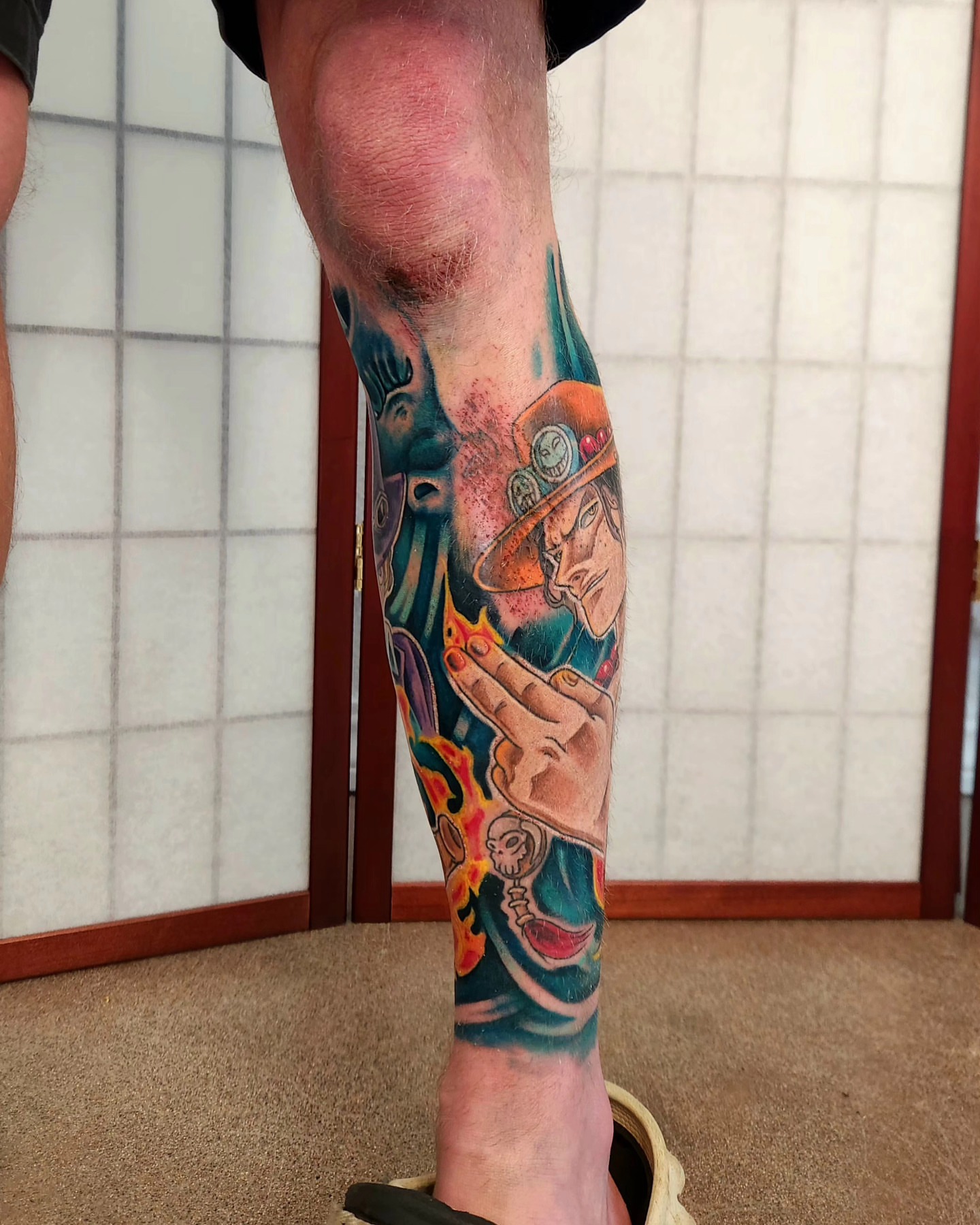 Pirate character anime tattoo on the forearm by Elizabeth Stepp
