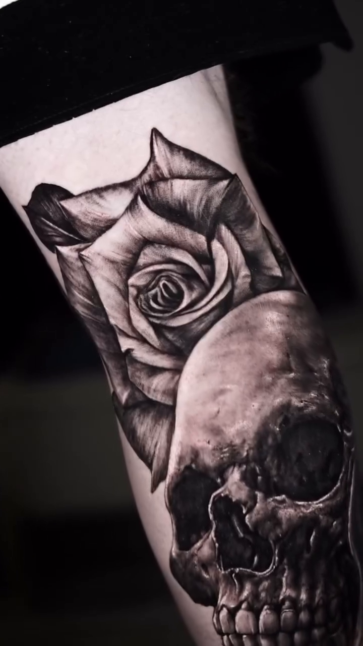 Skull and rose realism tattoo by Gregorio Devera