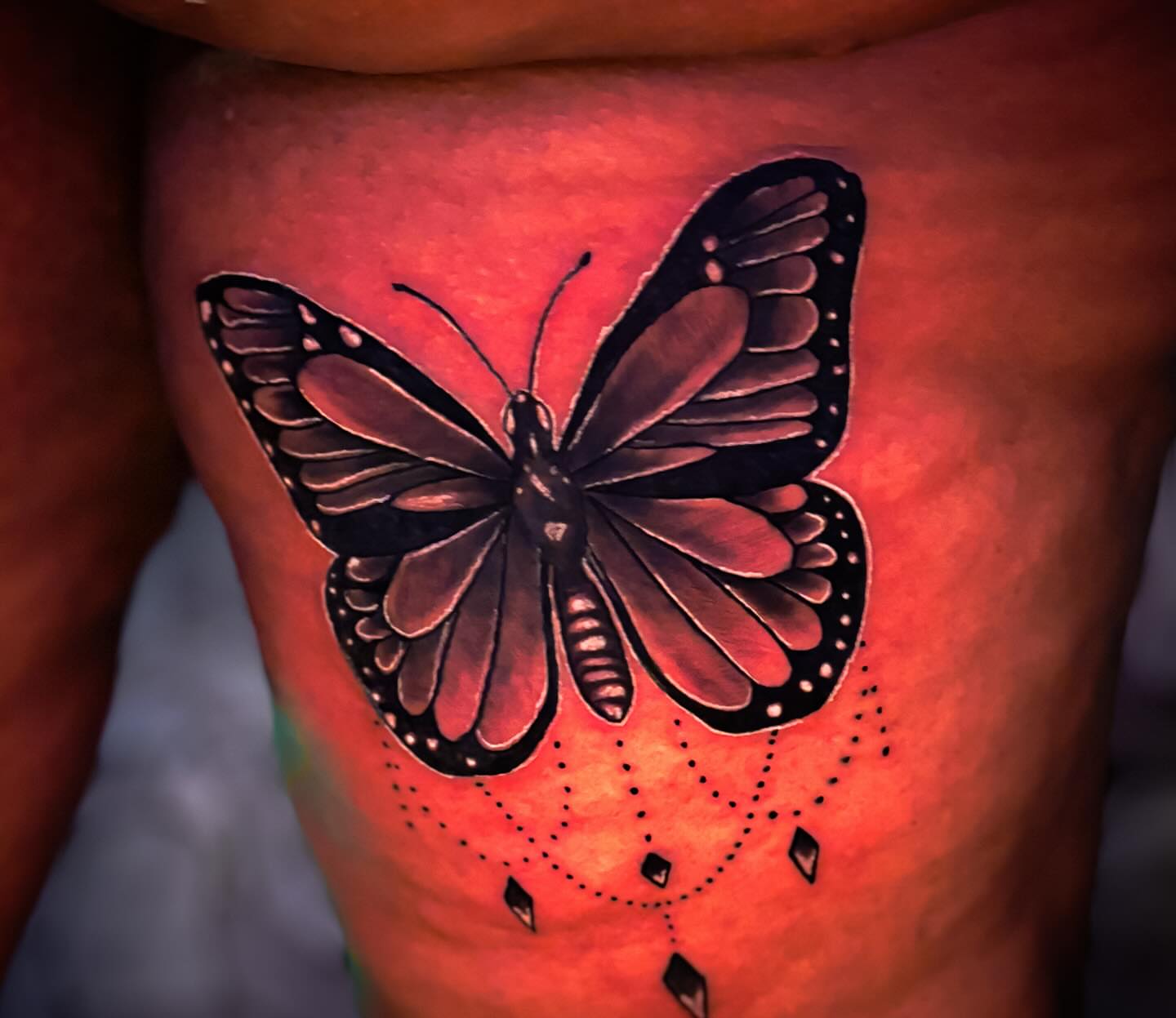 Butterfly dotwork tattoo on the thigh by Shane Boss, Toronto, Ontario
