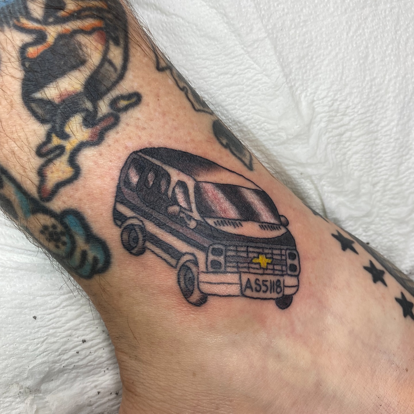 Van black and grey tattoo on the forearm by Mike Tapia