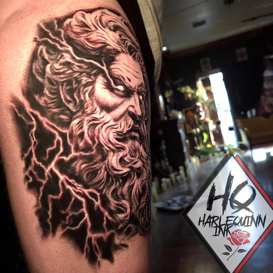 Zeus with lightning surrealism tattoo on the forearm by HarleQuinn_Ink