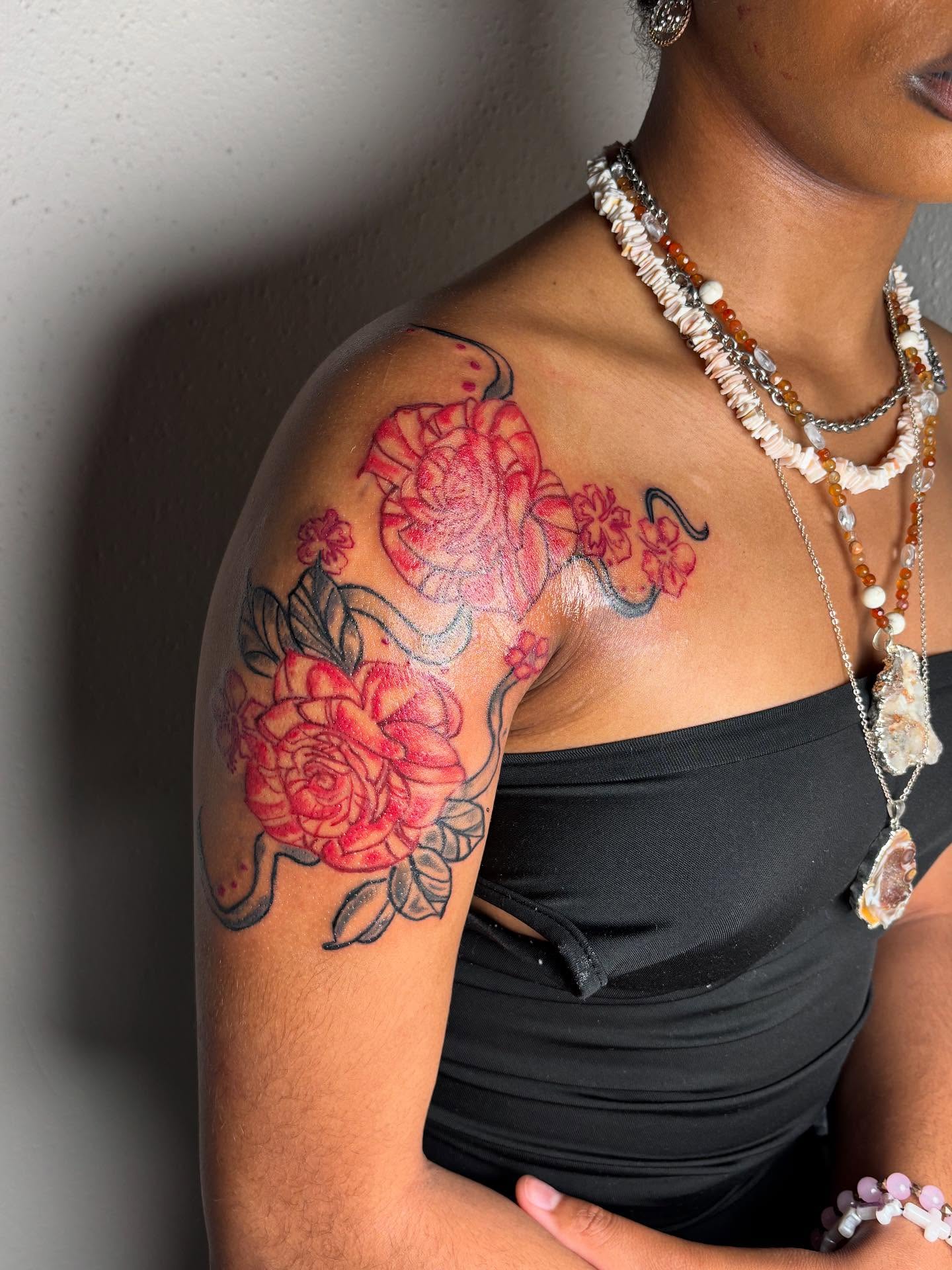 Floral bouquet American traditional tattoo on the shoulder by Mc X Happo