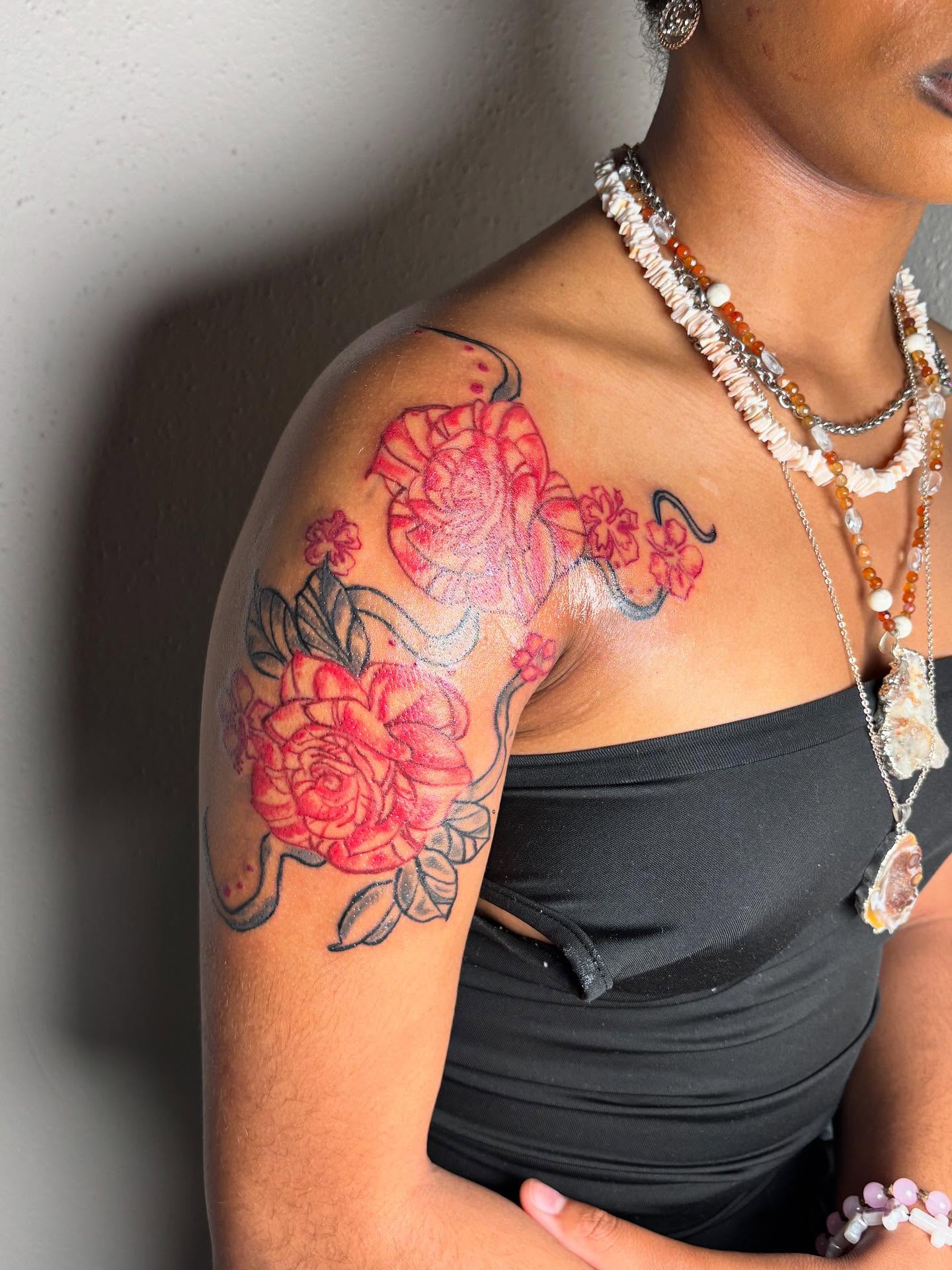 Floral bouquet American traditional tattoo on the shoulder by Mc X Happo