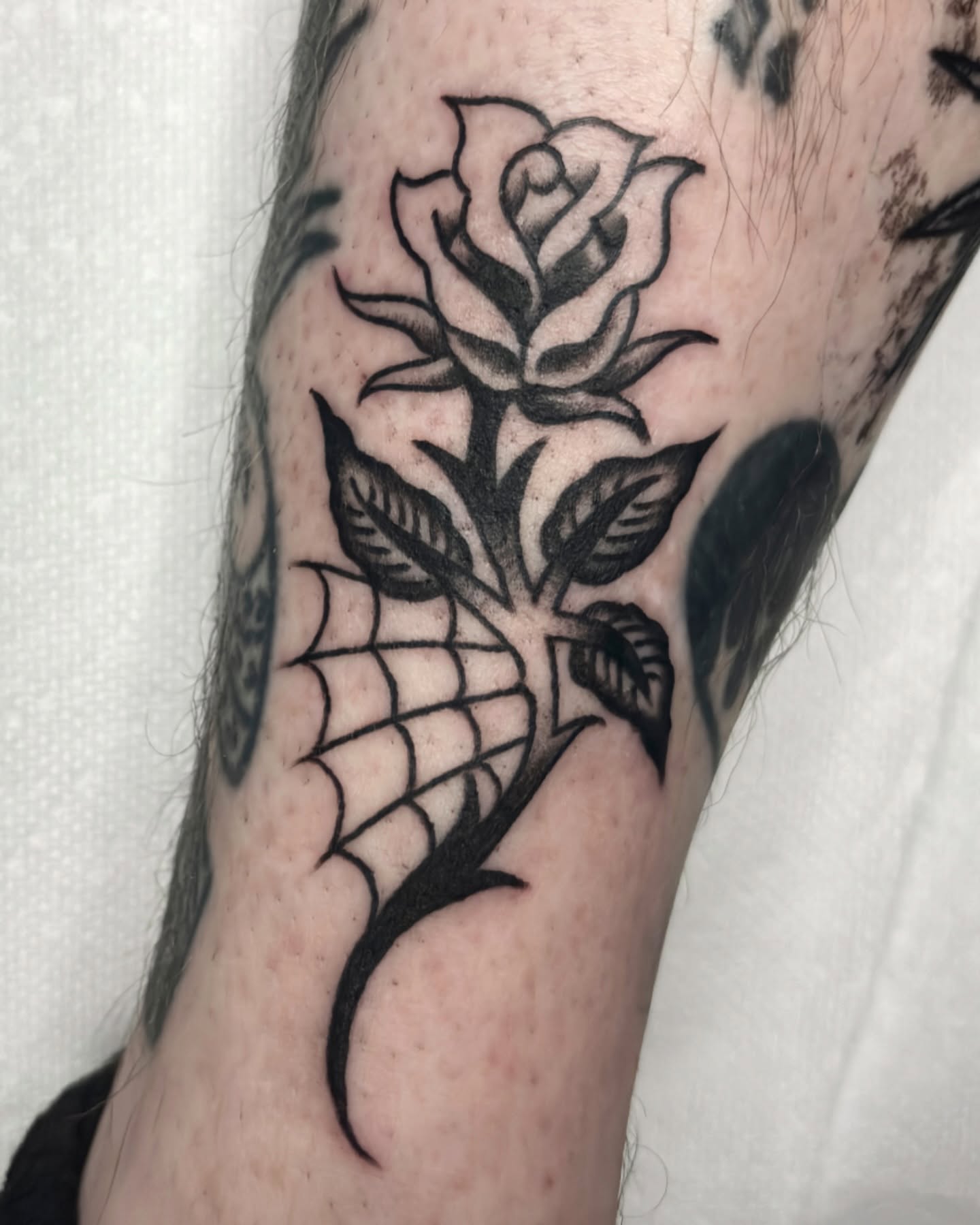 Rose black and grey tattoo on the forearm by Matt Elliott, Murfreesboro, Tennessee