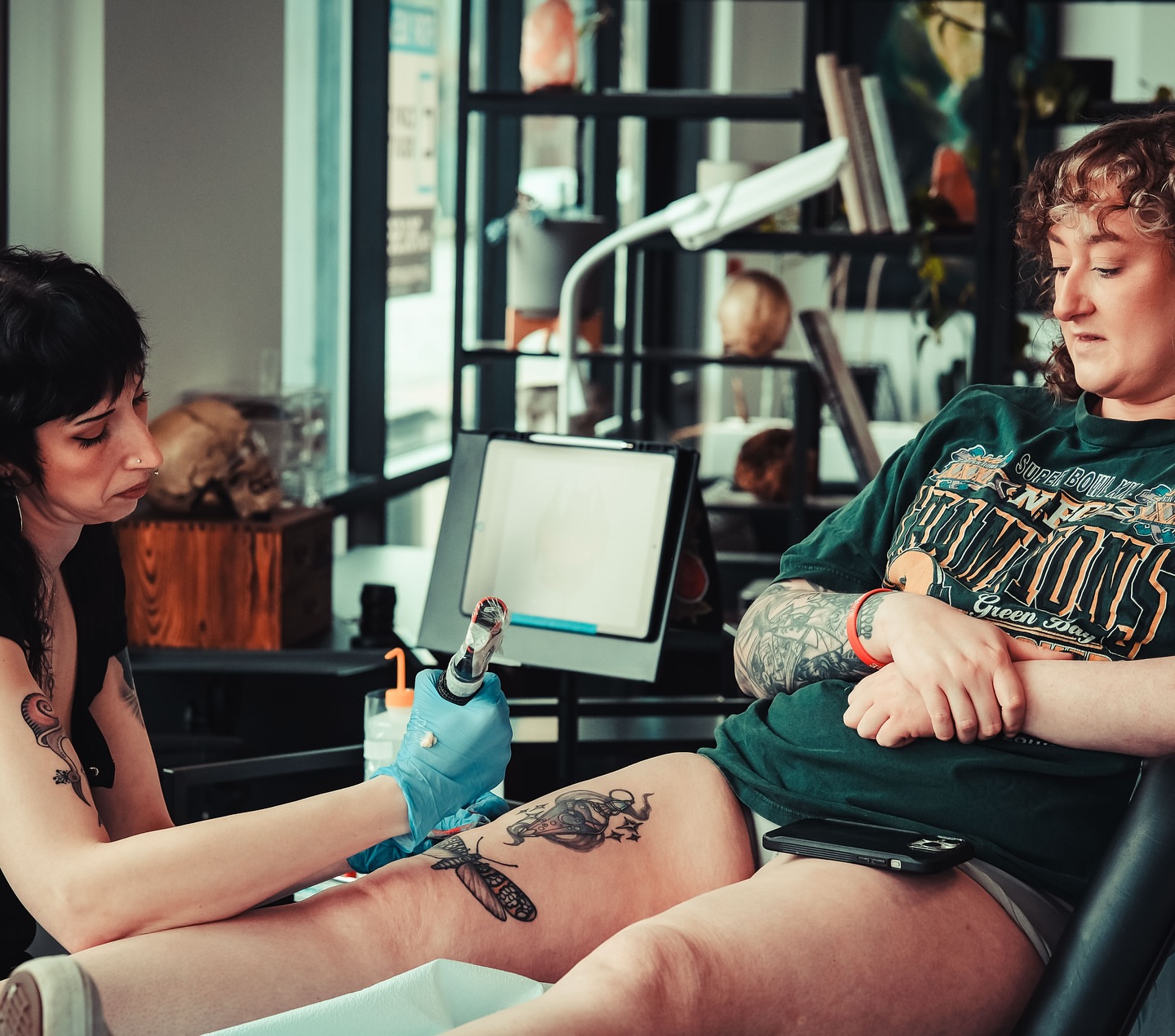 Dragonfly American traditional tattoo on the thigh by Rusty Dornhecker, Columbus, Ohio