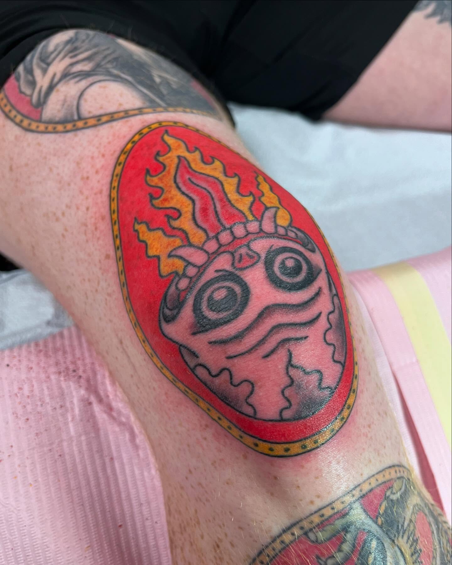 Mask American traditional tattoo on the forearm by Brian Mcfadden