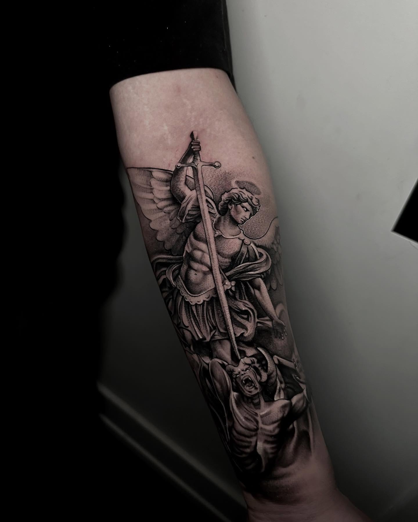 Angel with sword realism tattoo on the forearm by Rawb