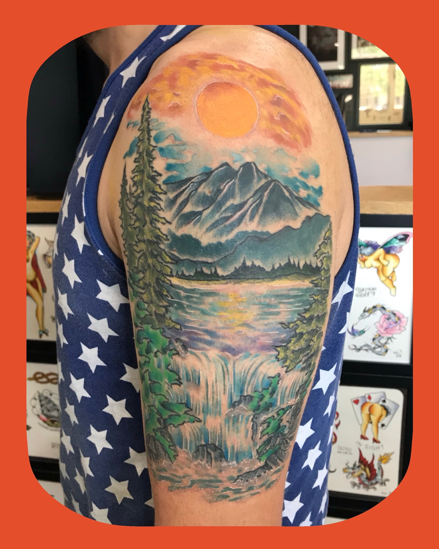 Landscape realism tattoo on the upper arm by Chris Chapman