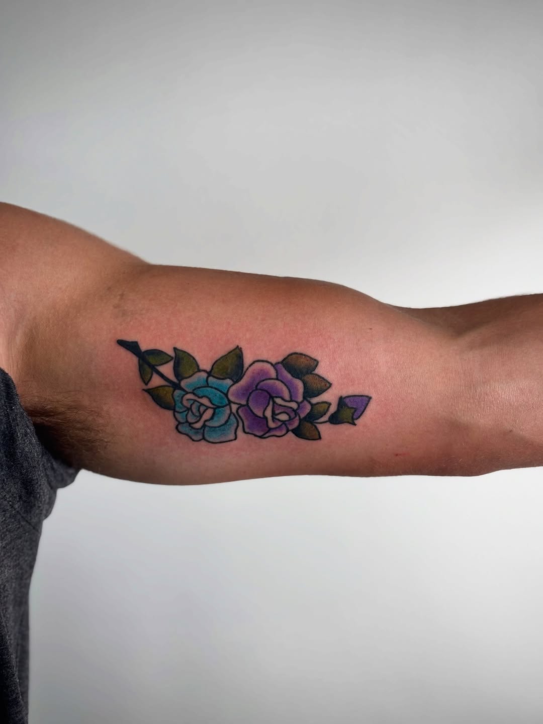 Two roses and leaves watercolor tattoo on the forearm by ♱ C ♱, Dallas, Texas