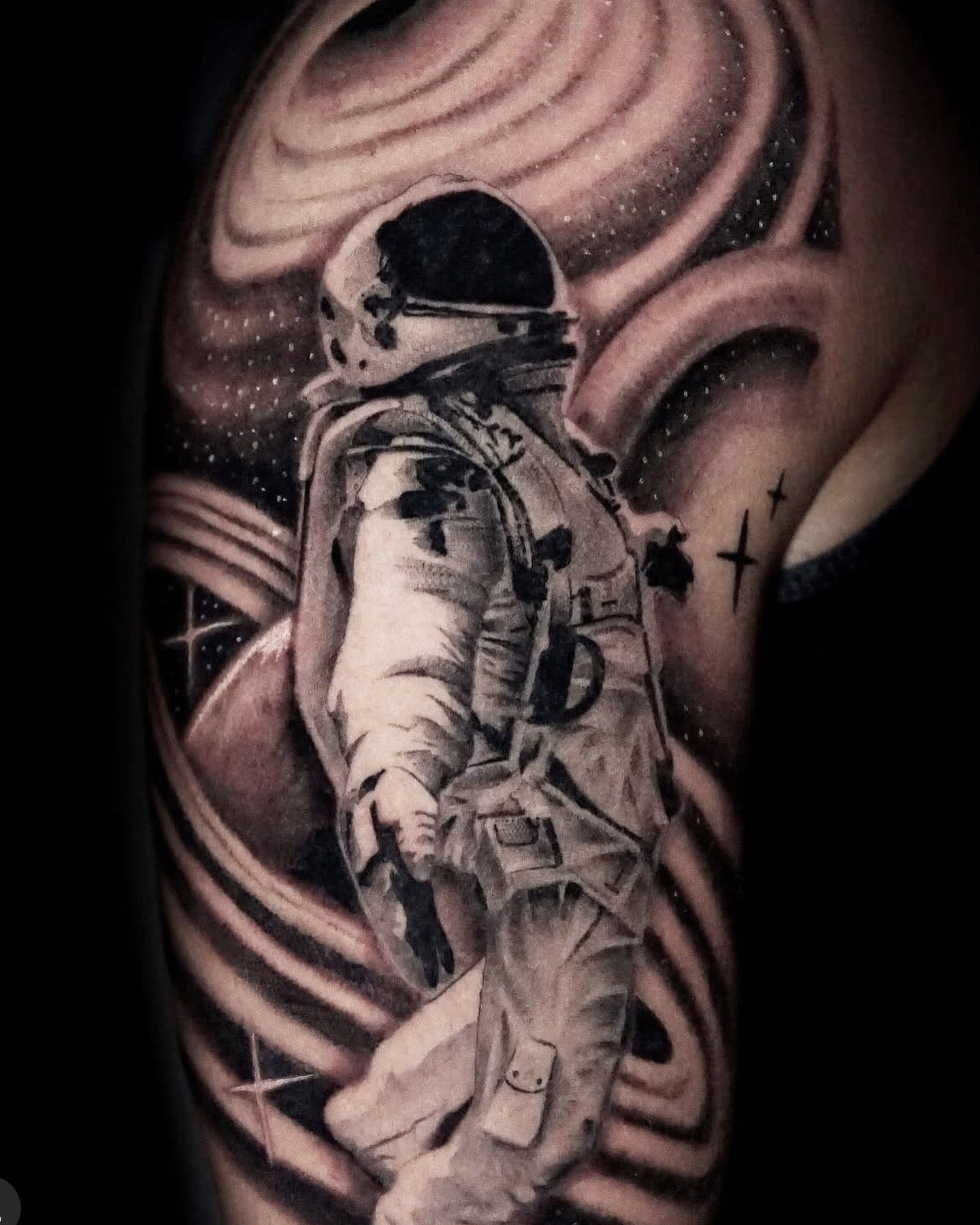 Astronaut realism tattoo on the forearm by Johnson