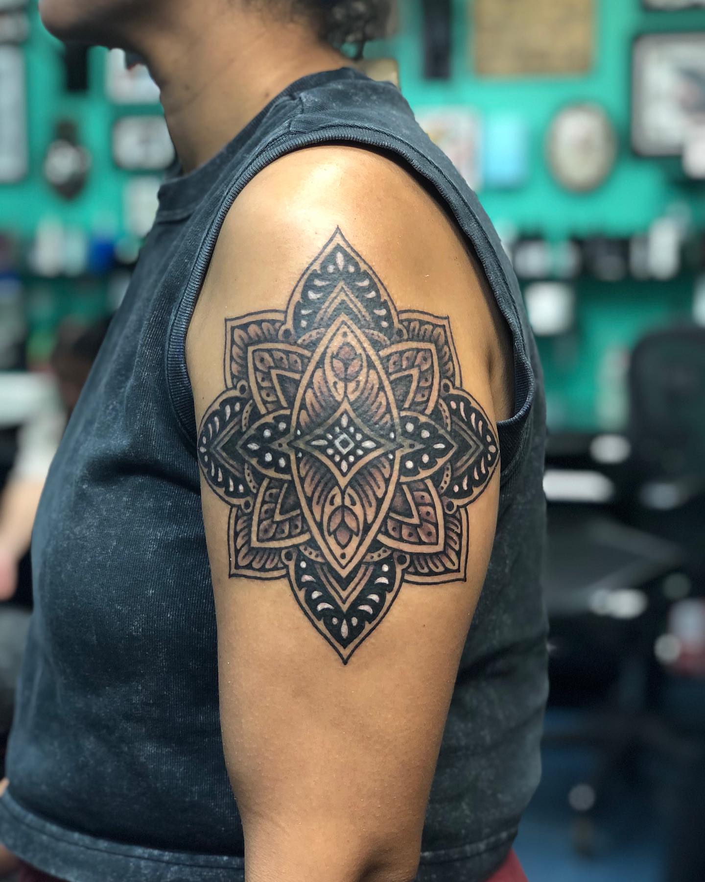 Mandala geometric tattoo on the shoulder by Matt Klass