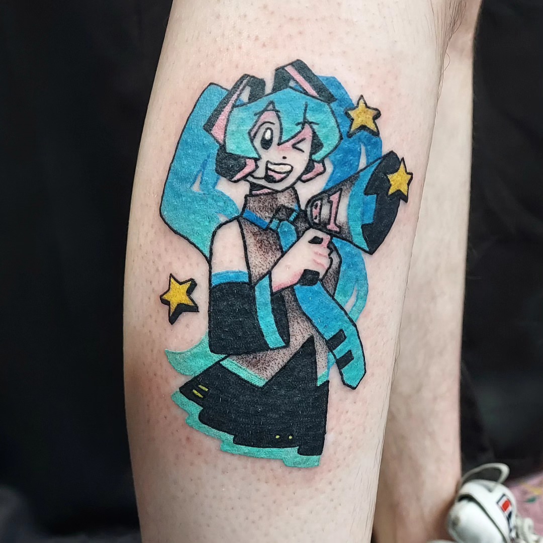 Anime character anime tattoo on the forearm by Spike Cameron