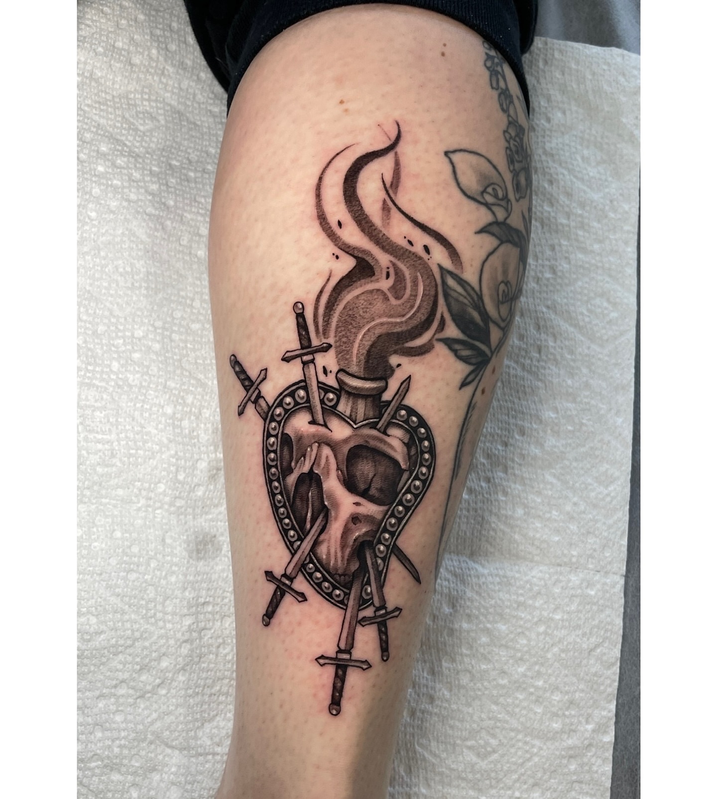Heart pierced by swords realism tattoo on the thigh by Morrison Vo