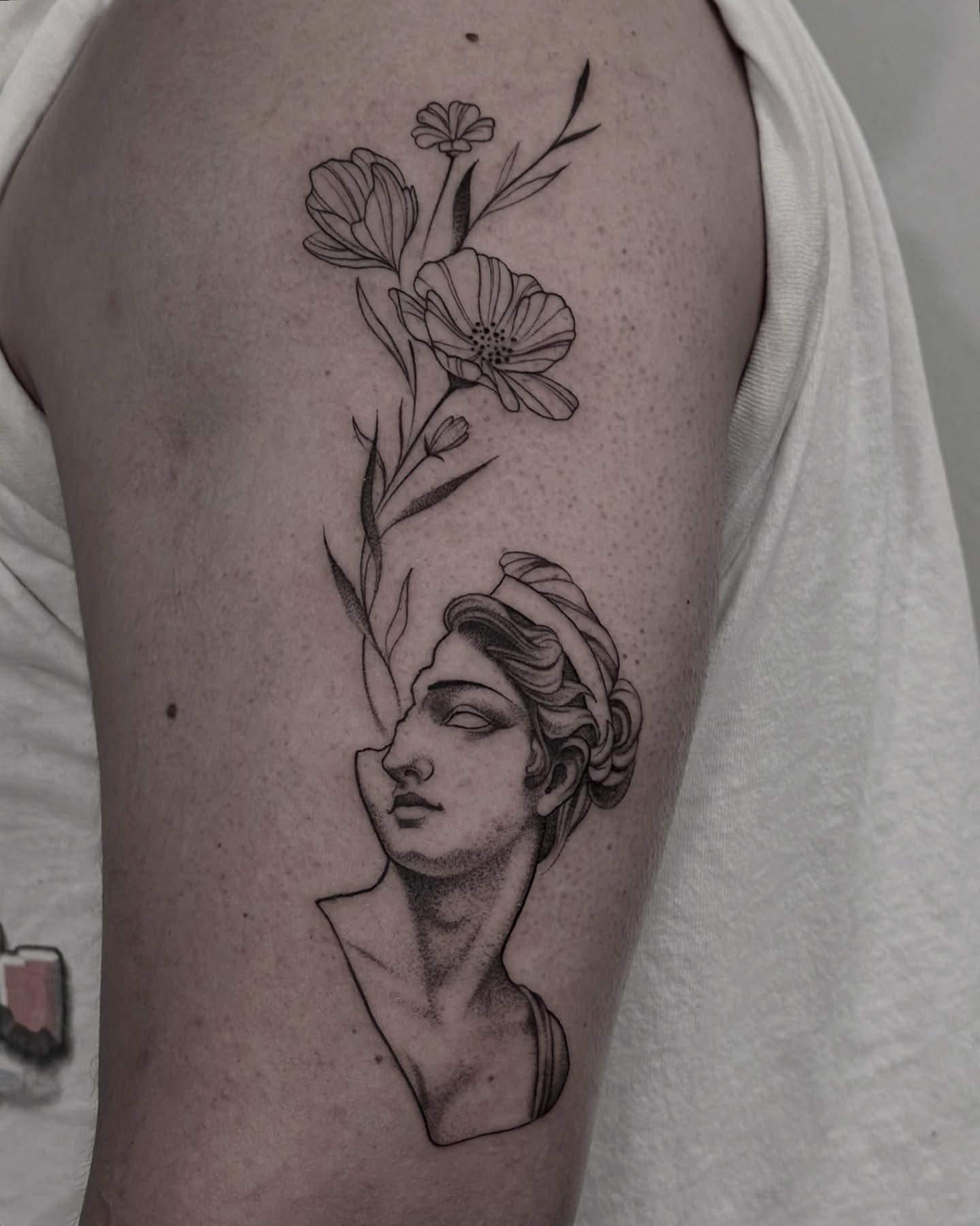 Tattoo by @beholds_ — black_and_grey, realism