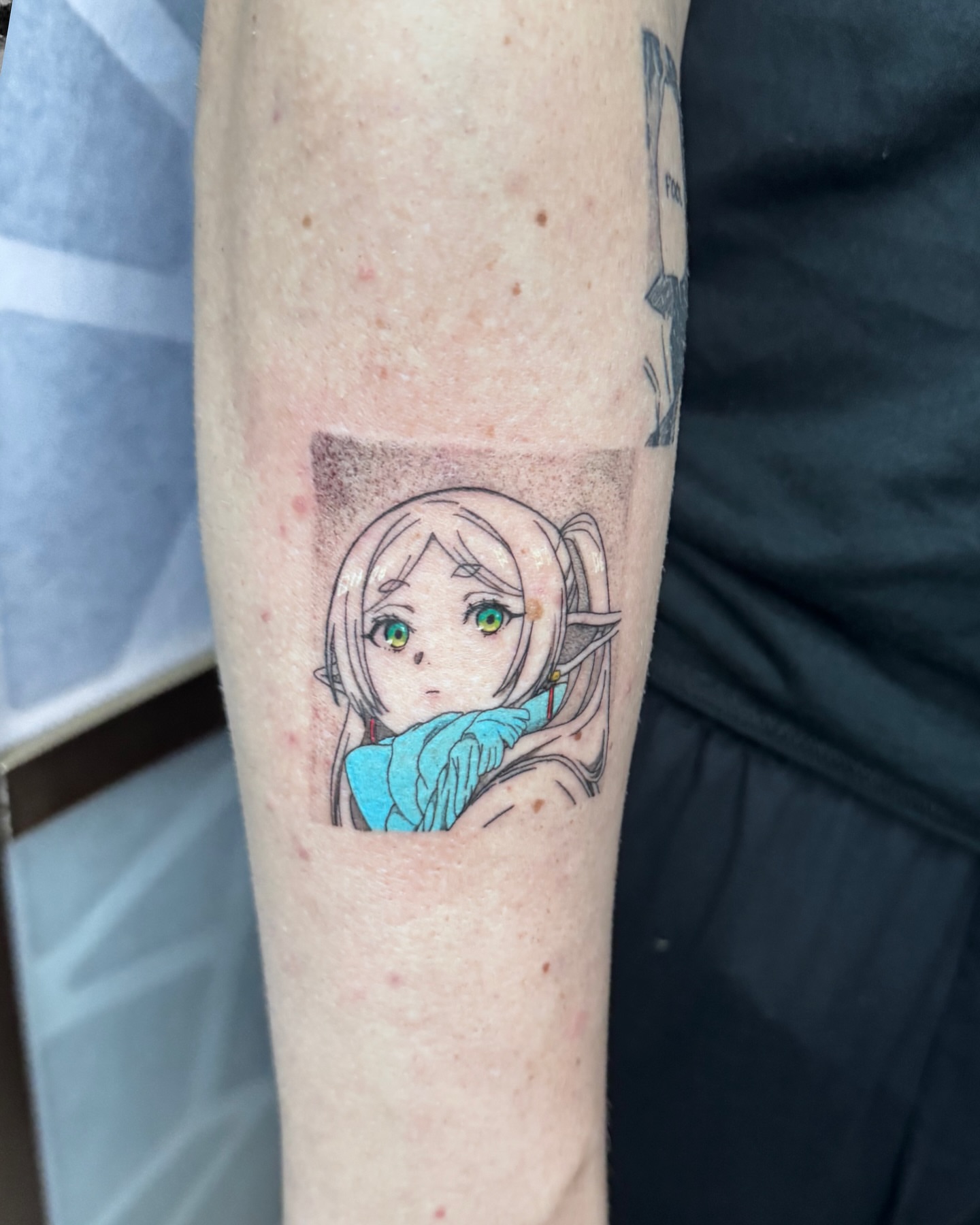 Anime character anime tattoo on the forearm by D