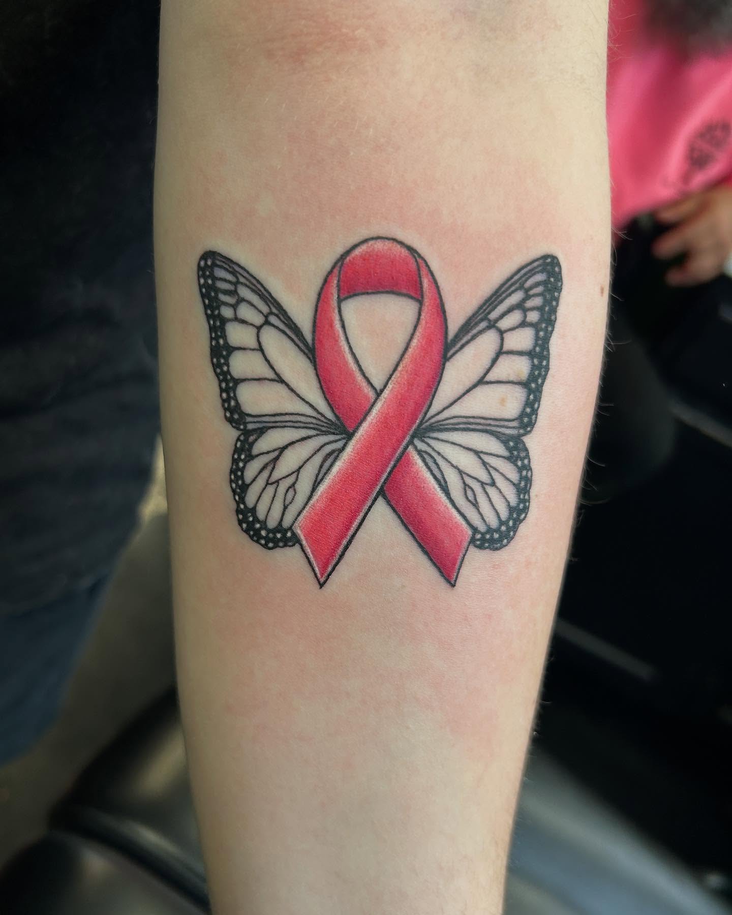 Breast cancer awareness ribbon black and grey tattoo on the forearm by B Hendrix, Cuyahoga Falls, Ohio