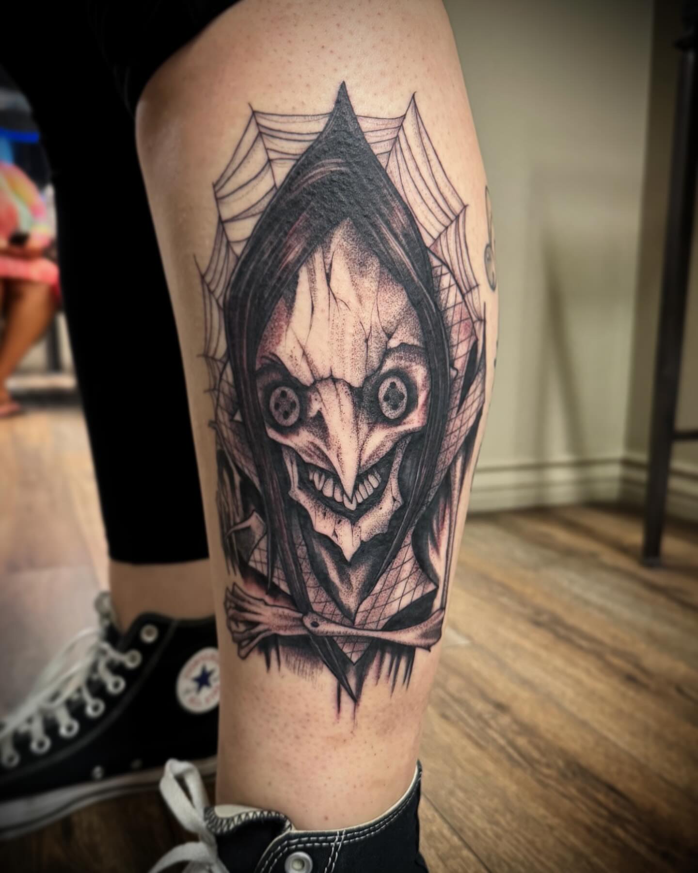 Scary clown dark realism tattoo on the thigh by Cj Hurtado