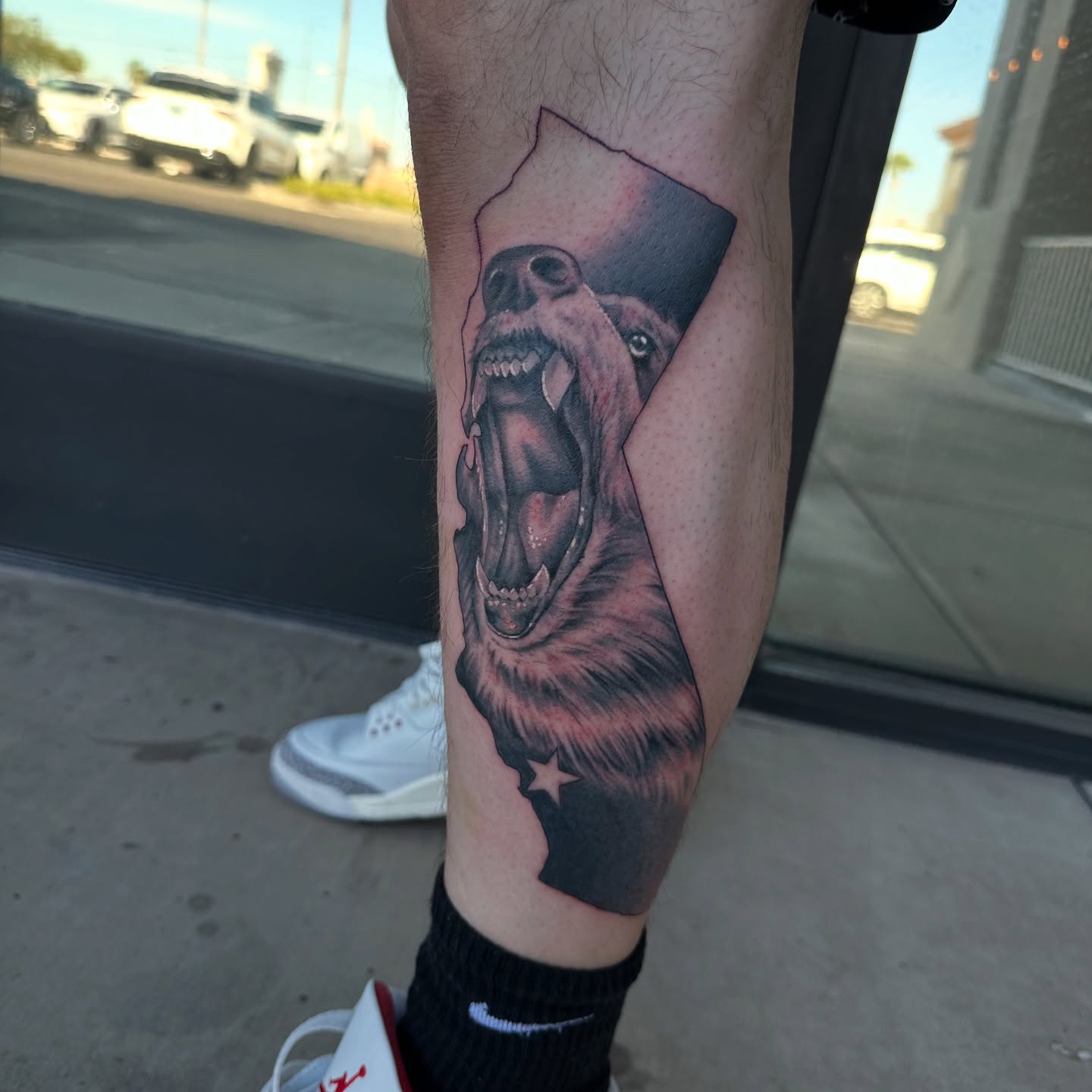 Roaring bear realism tattoo on the forearm by Jevon Glasco Tattoos