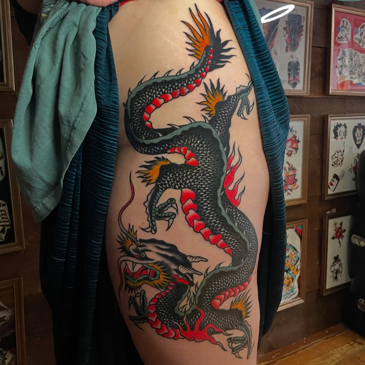 Dragon American traditional tattoo on the thigh by Texas Jonah