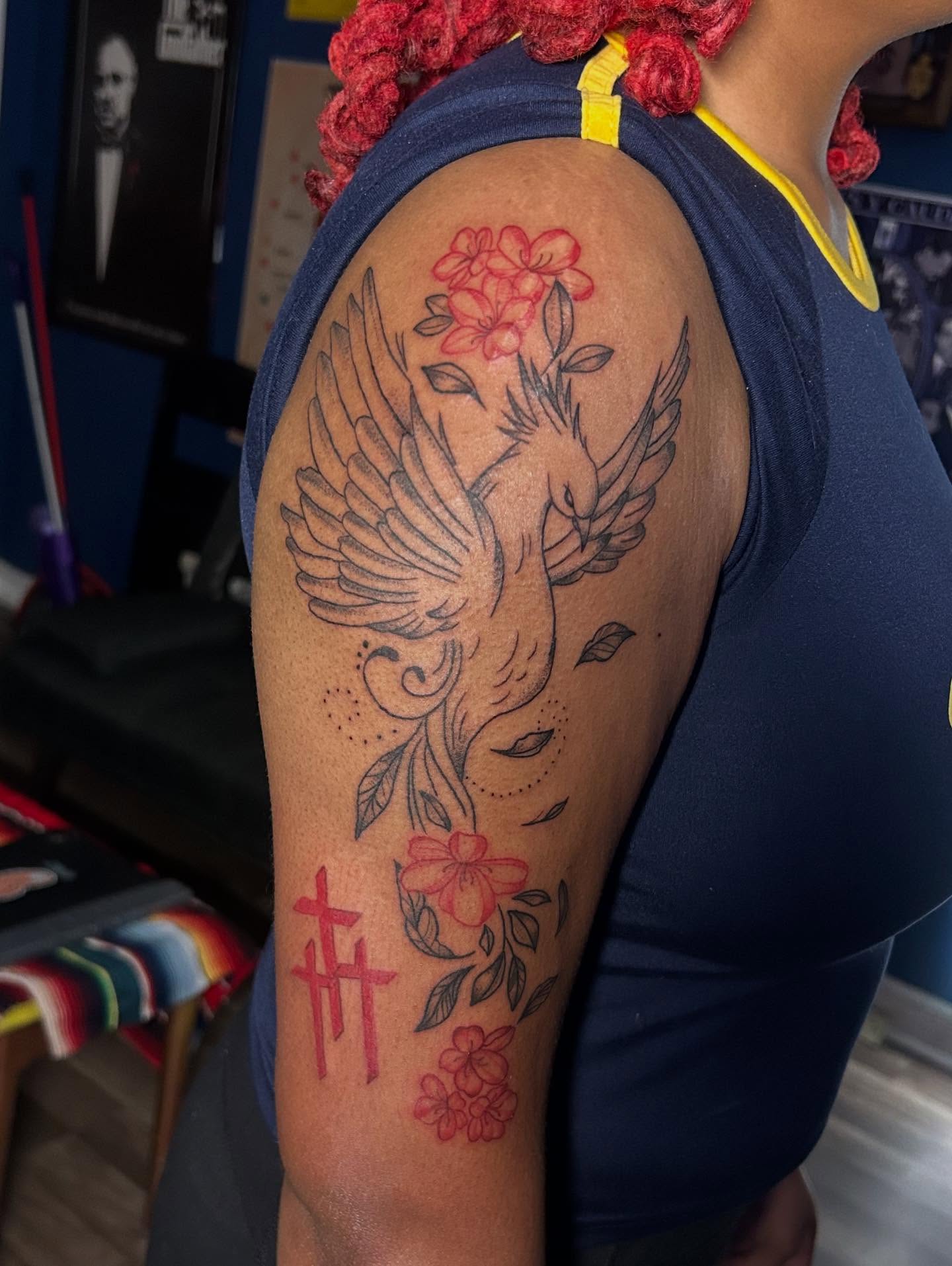 Bird and flowers dotwork tattoo on the shoulder by Kells