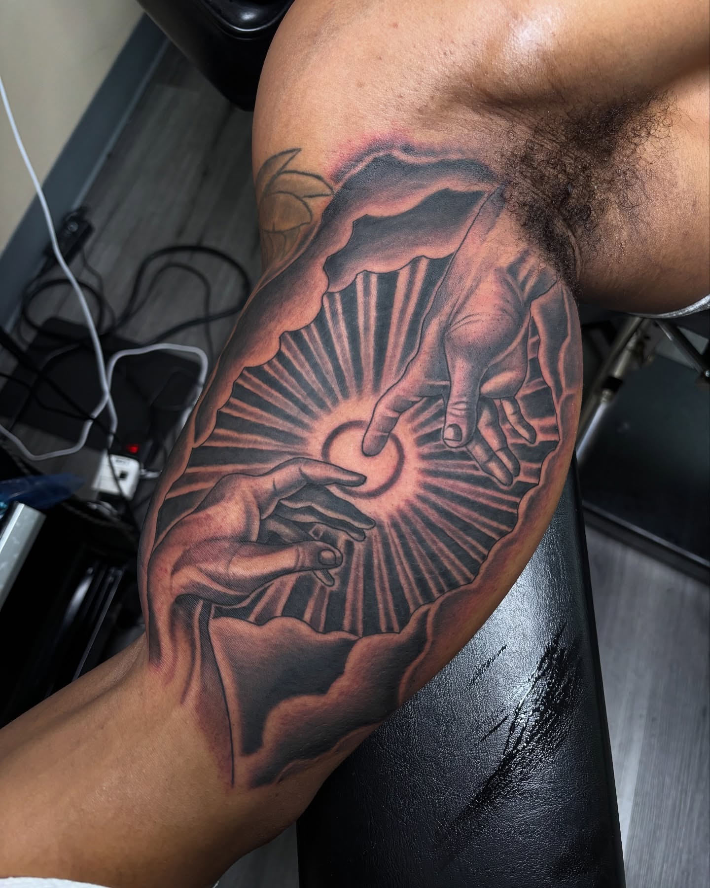 Creation realism tattoo on the forearm by Tattoos By Rico