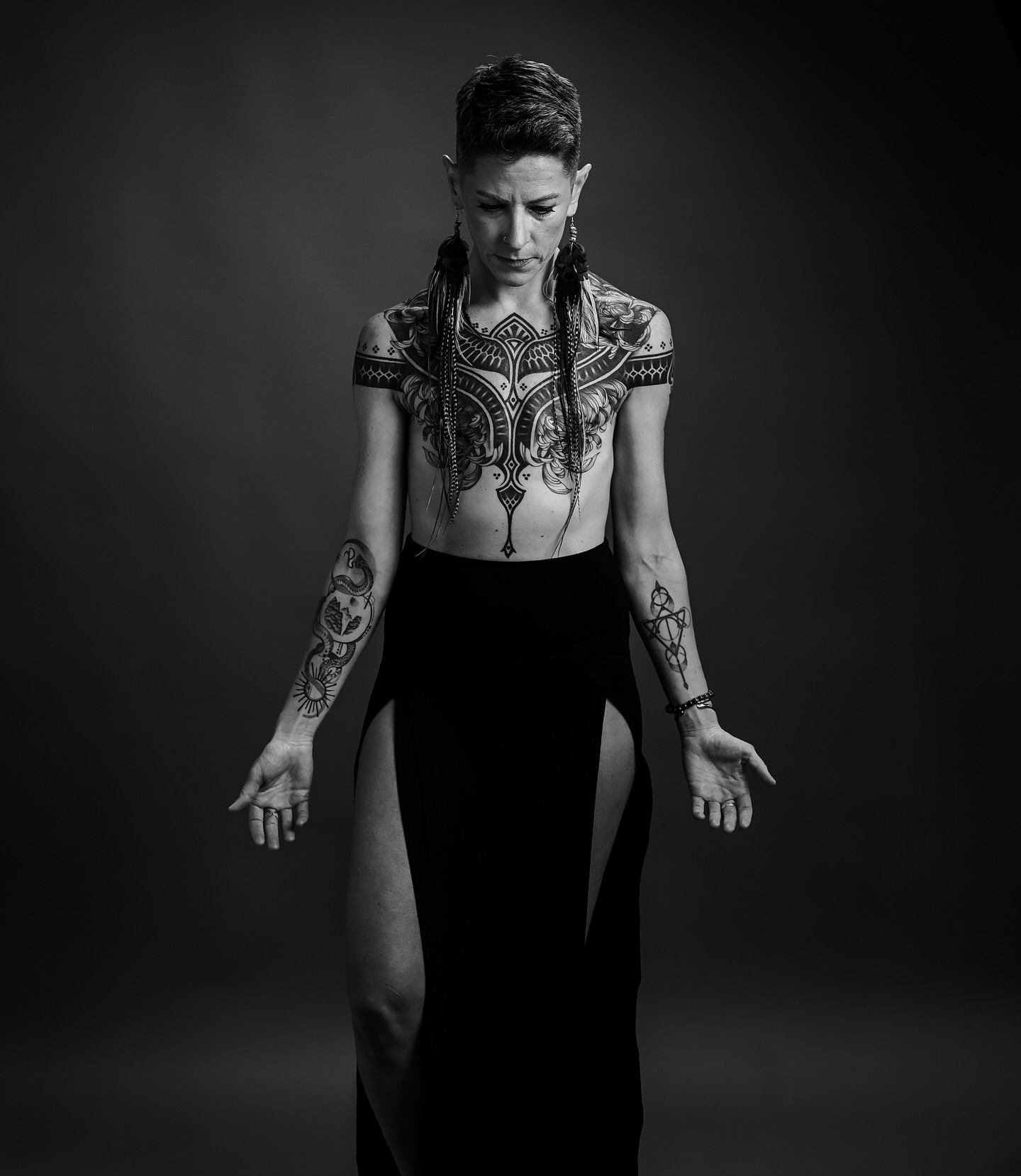 Tribal tribal tattoo on the torso by Katie Mizuno, Berkeley, California