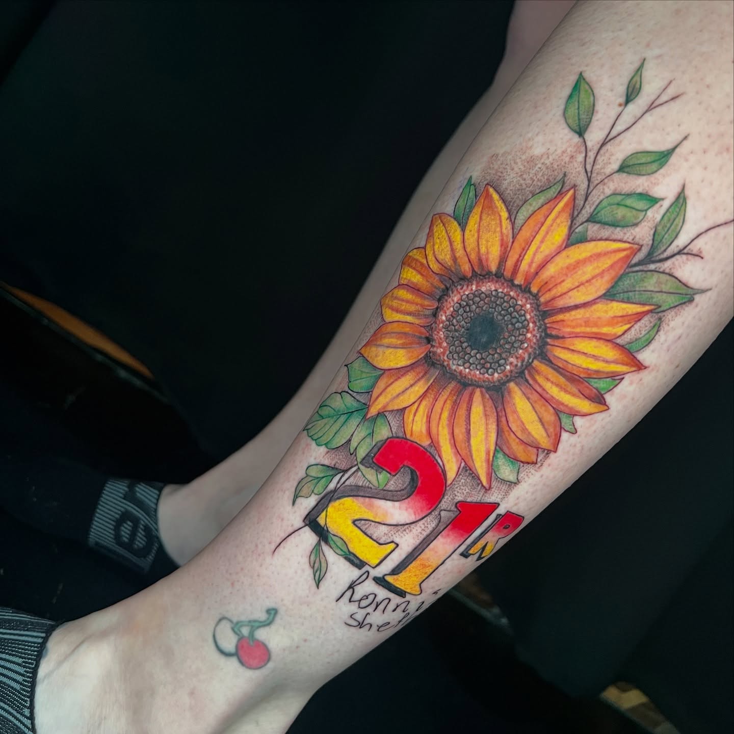 Sunflower realism tattoo on the forearm by Daphne Landry