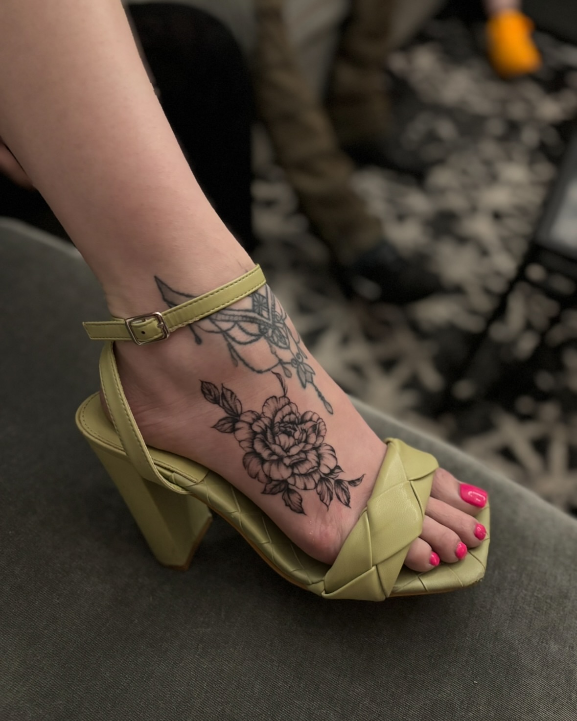 Flower black and grey tattoo on the foot by $weet little leslie 🩶🧚🏻‍♀️