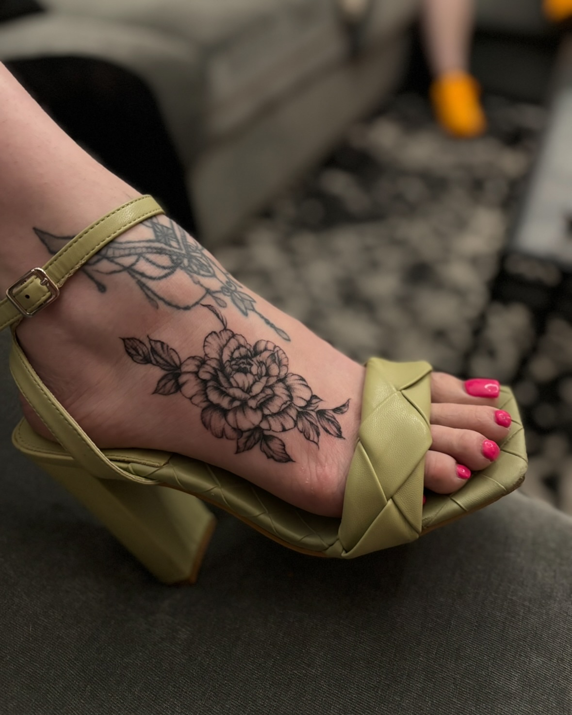 Flower black and grey tattoo on the foot by $weet little leslie 🩶🧚🏻‍♀️