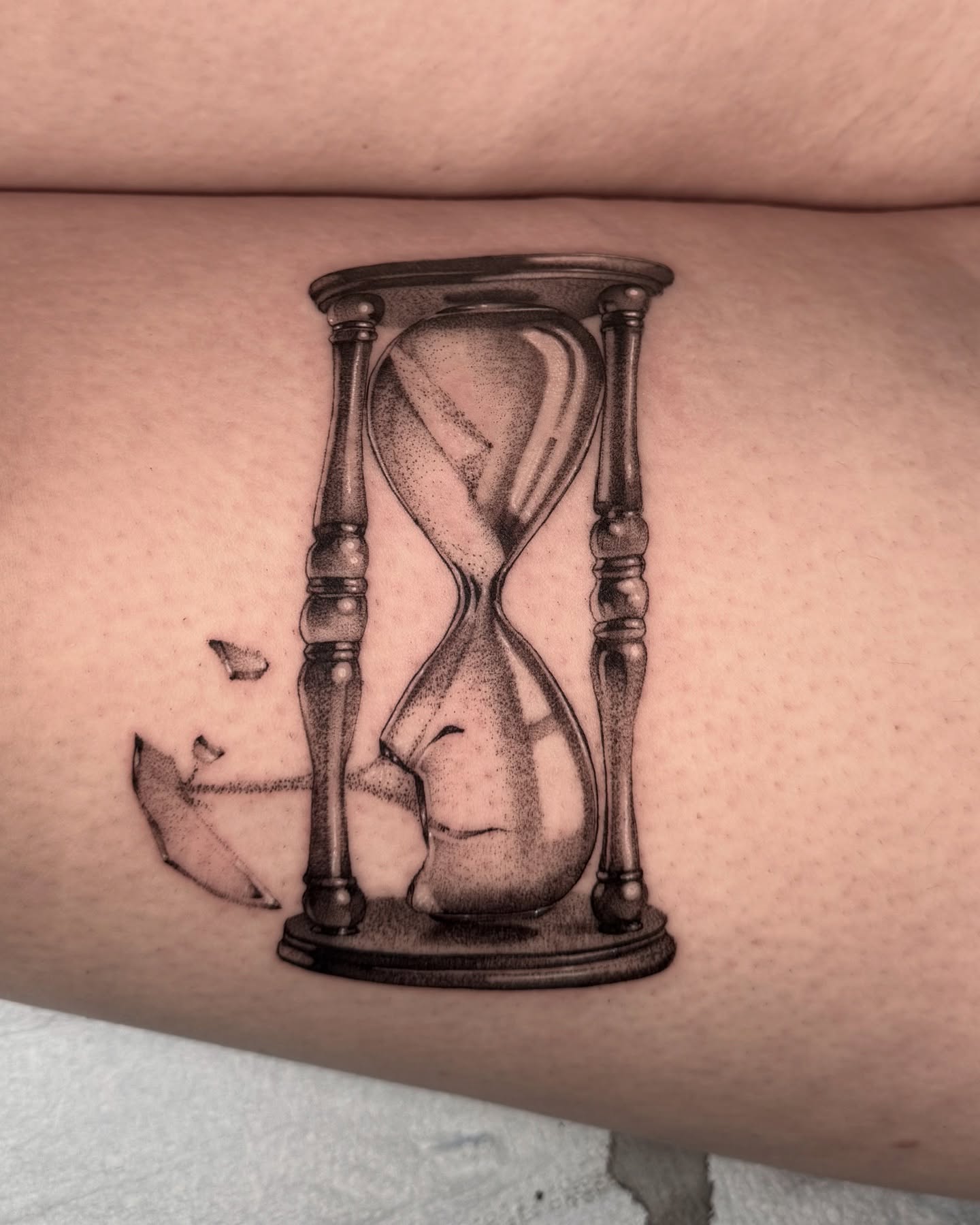 Hourglass black and grey tattoo on the forearm by Carla AKA Turnip girl