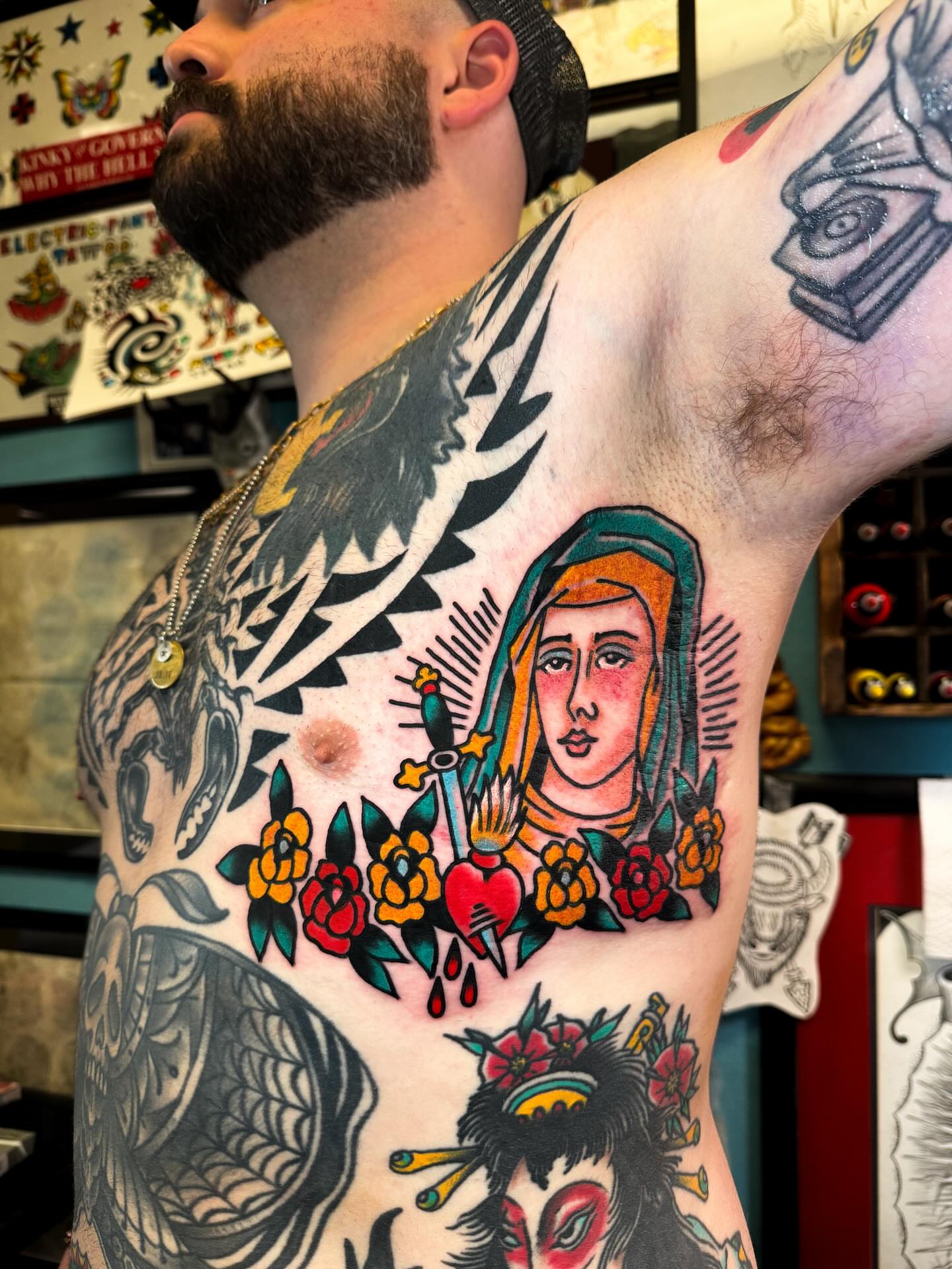 Religious figure with flowers American traditional tattoo on the chest by Alex Kass 🥩 San Antonio TX, San Antonio, Texas