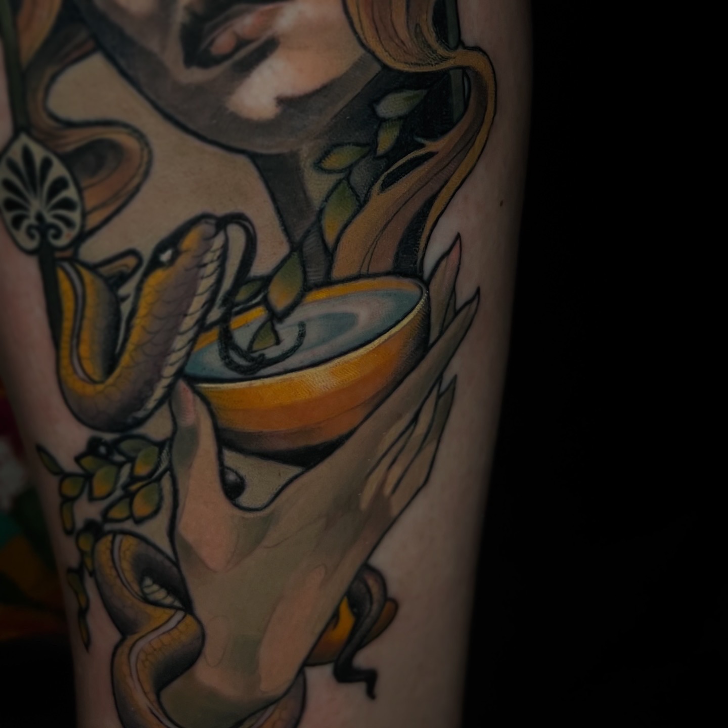 Snake and bowl American traditional tattoo on the forearm by Joshua Weeks
