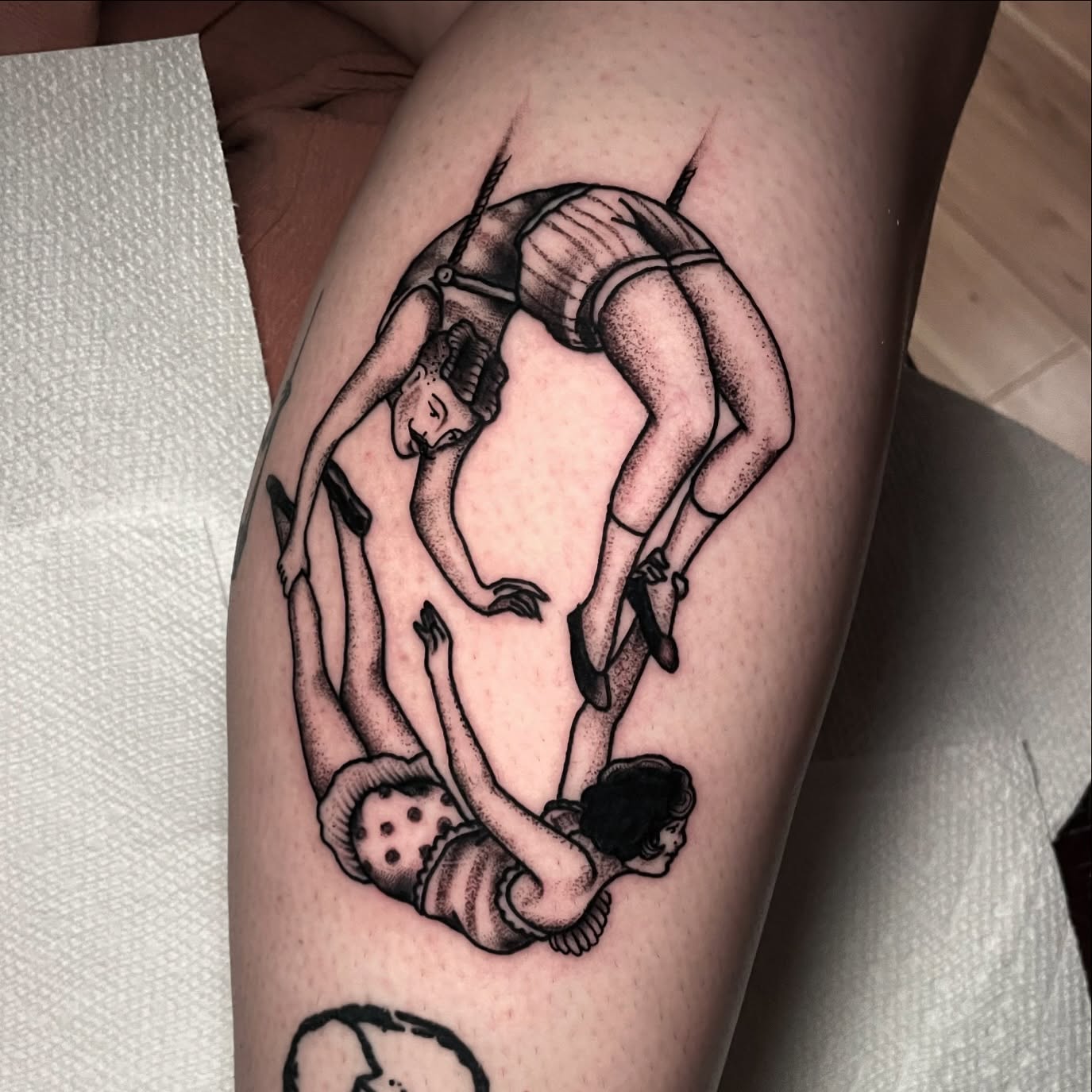 Family dotwork tattoo on the thigh by Ian Spong