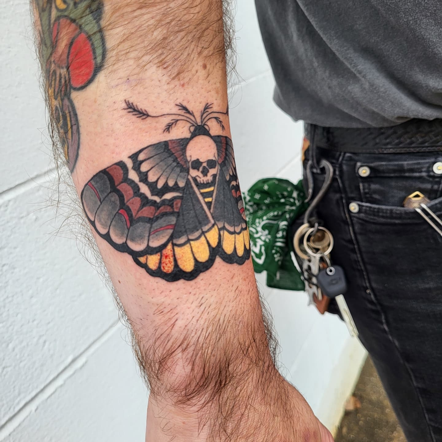 Moth with skull head realism tattoo on the forearm by Jenna 🖤 Tattoos Denton TX