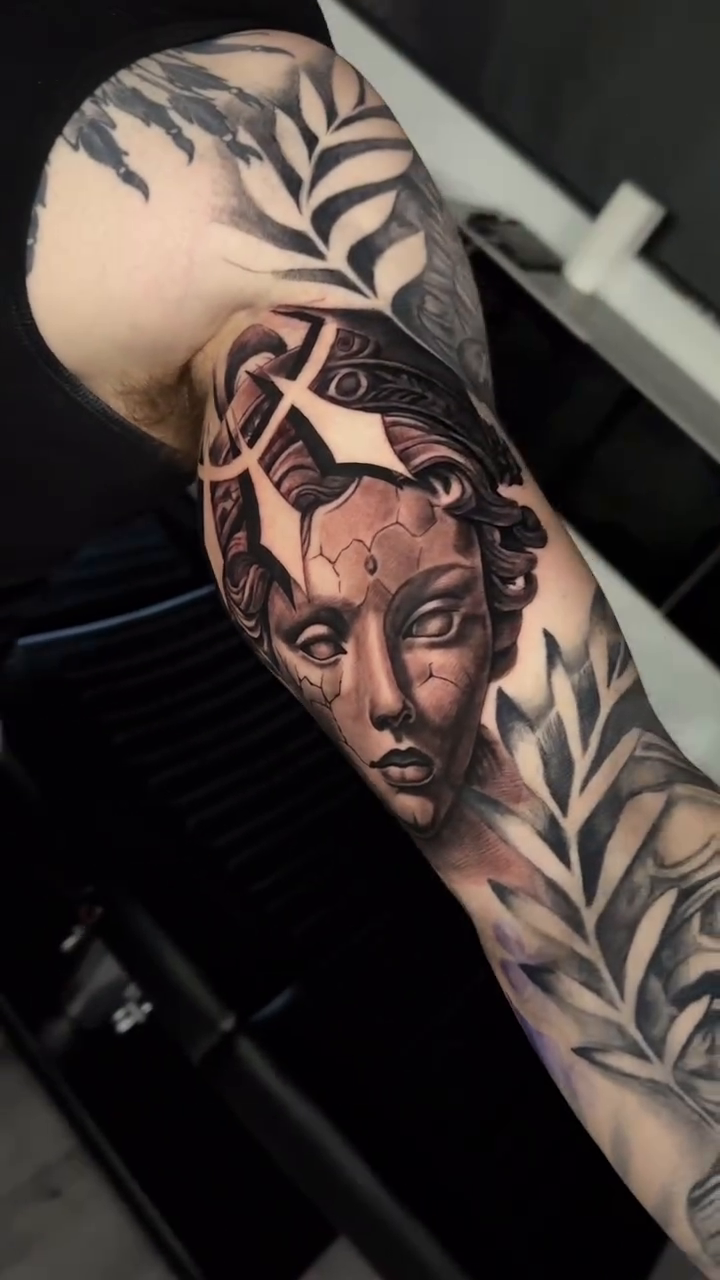 Statue of a woman realism tattoo by Rafa