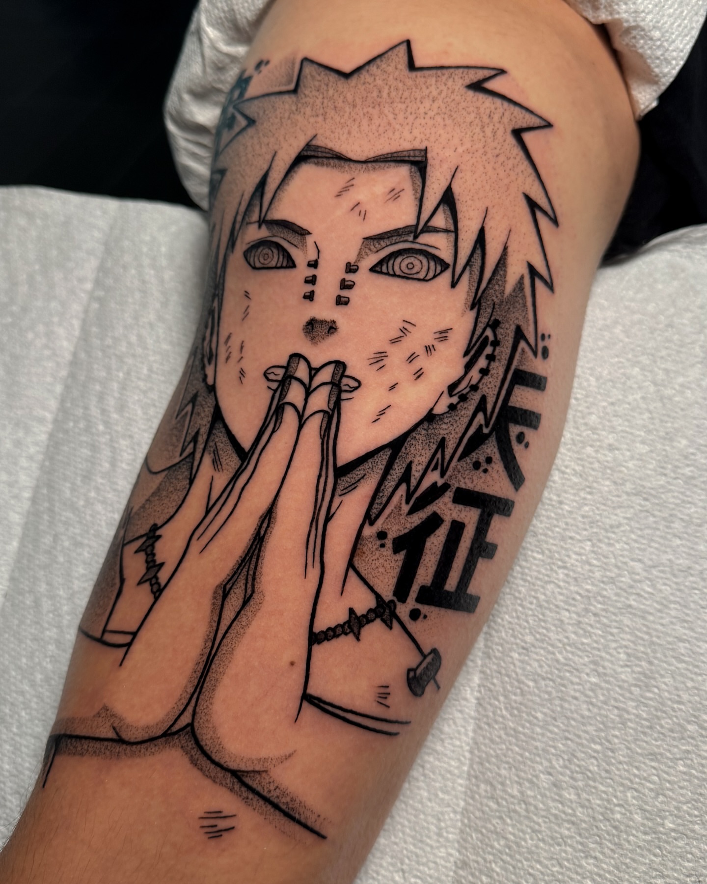 Anime character dotwork tattoo on the forearm by Yakir, Houston, Texas