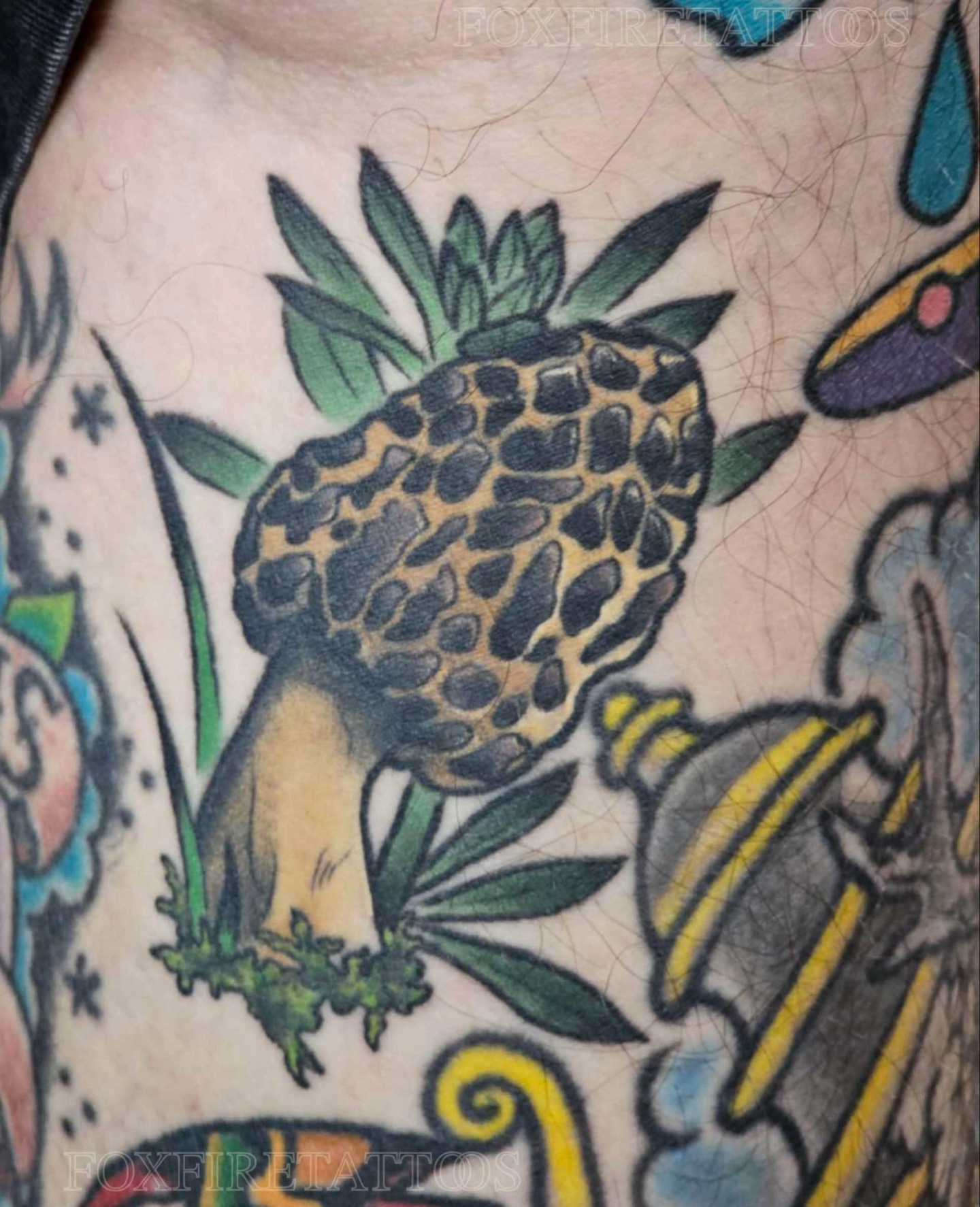 Pineapple American traditional tattoo on the chest by Lindsey Chevalier - KCMO TATTOO ARTIST