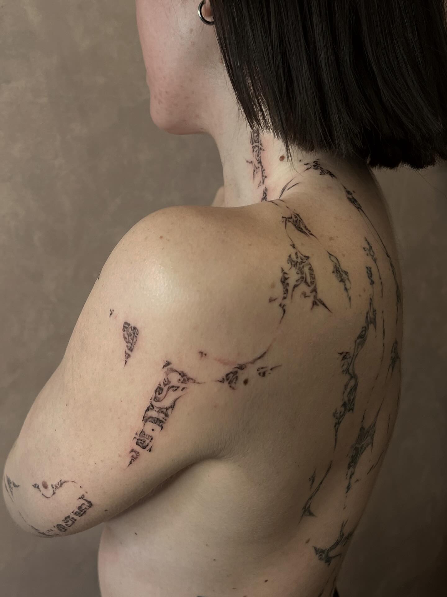 Tattoo by @orbritual — black_and_grey, dotwork
