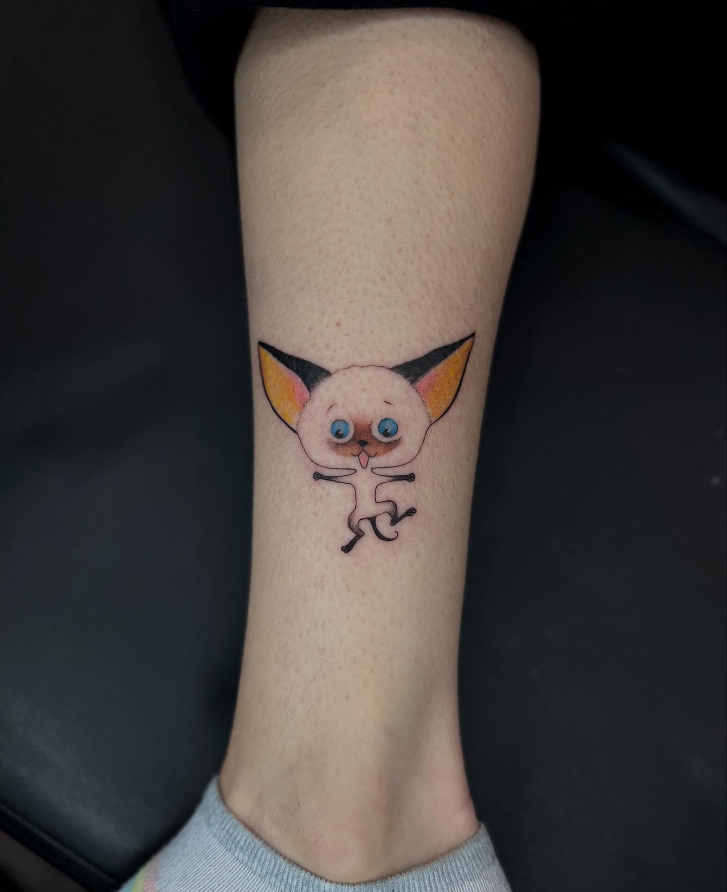 Cat dotwork tattoo on the forearm by Alexa Camacho