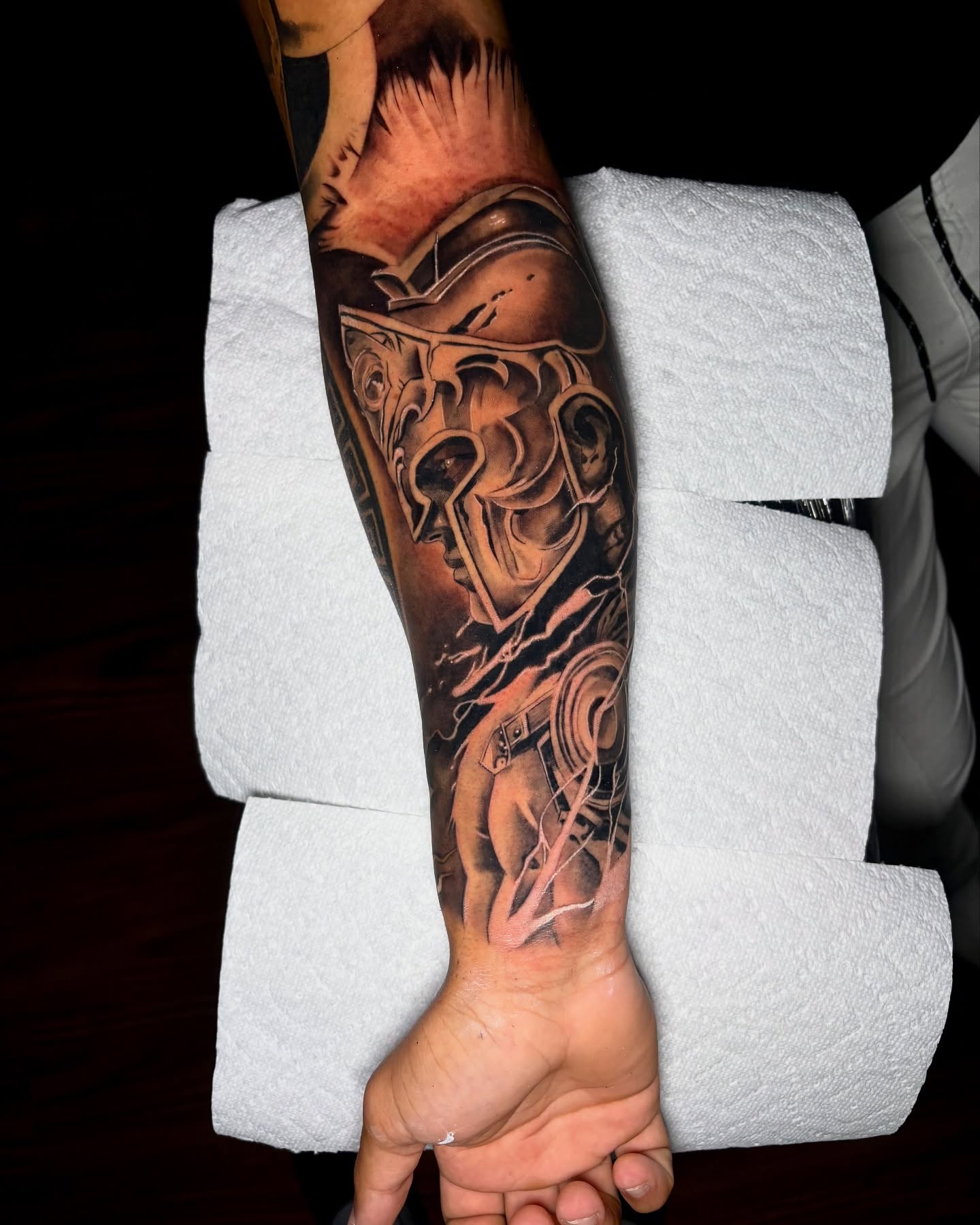 Mecha soldier realism tattoo on the forearm by Kevin Palma