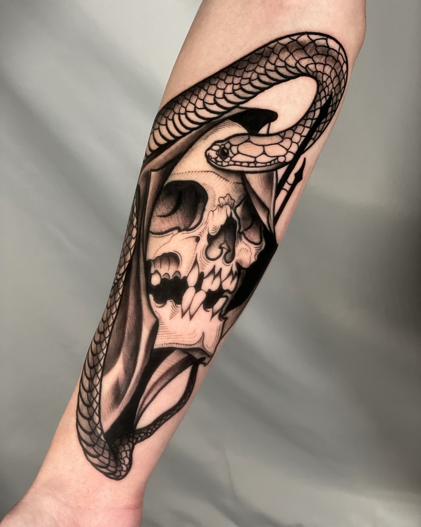 Snake and skull realism tattoo on the forearm by ✖️mike Alan✖️