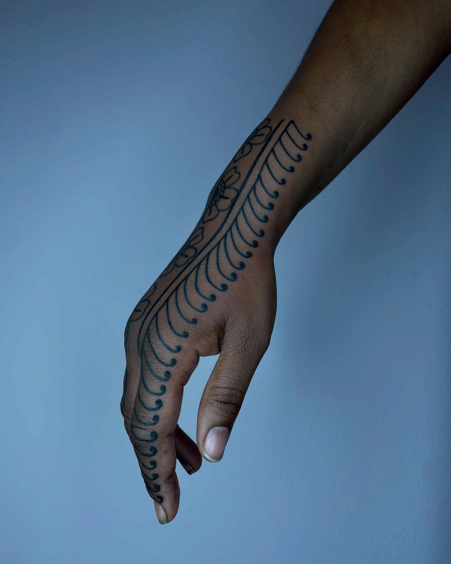 Wave pattern black and grey tattoo on the hand by Danika Brooke 🧿