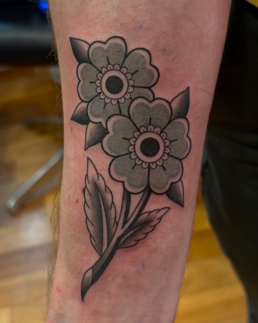 Flowers American traditional tattoo on the forearm by Alicia