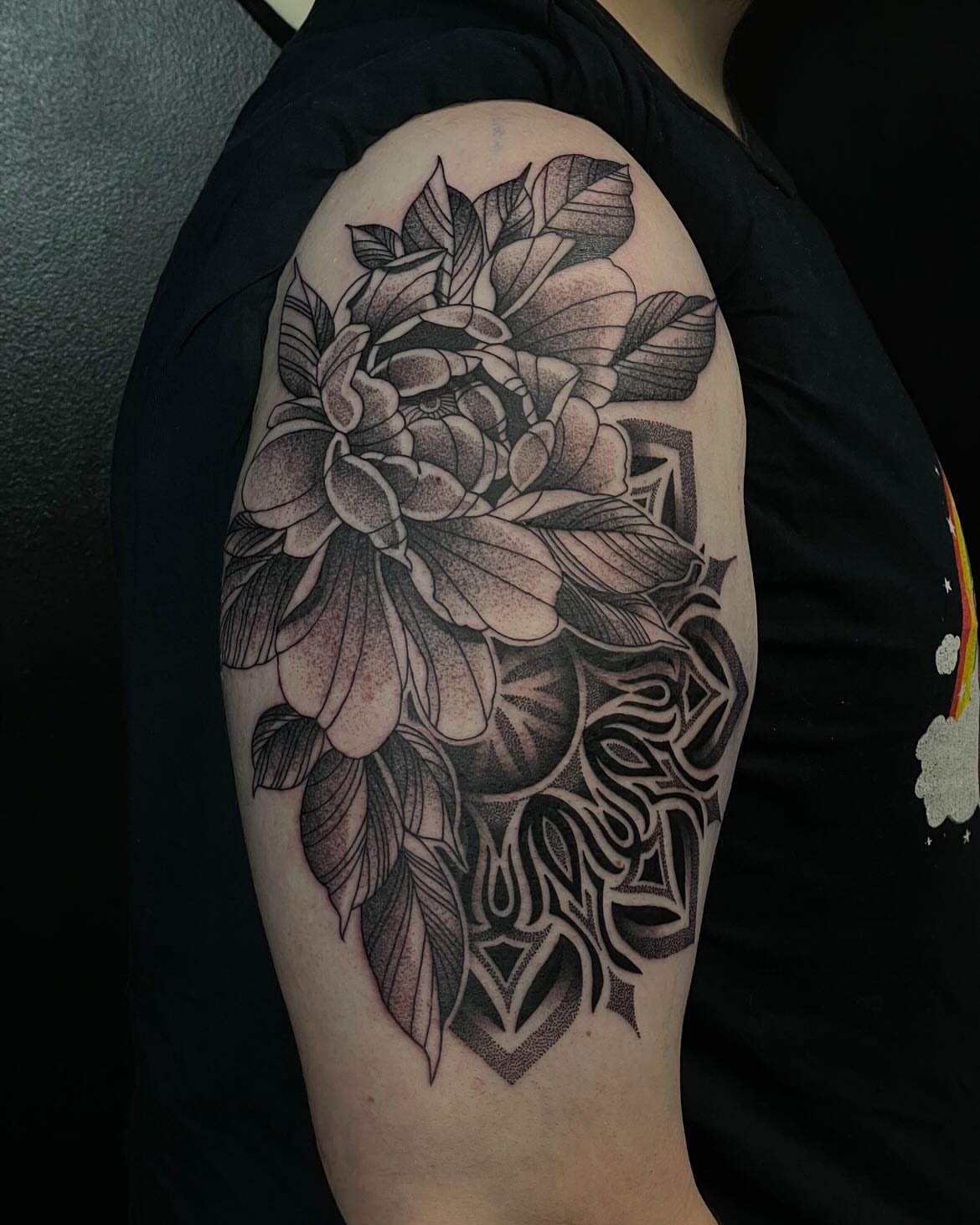 Peony and floral dotwork tattoo on the shoulder by Jesse (Dreadzilla)